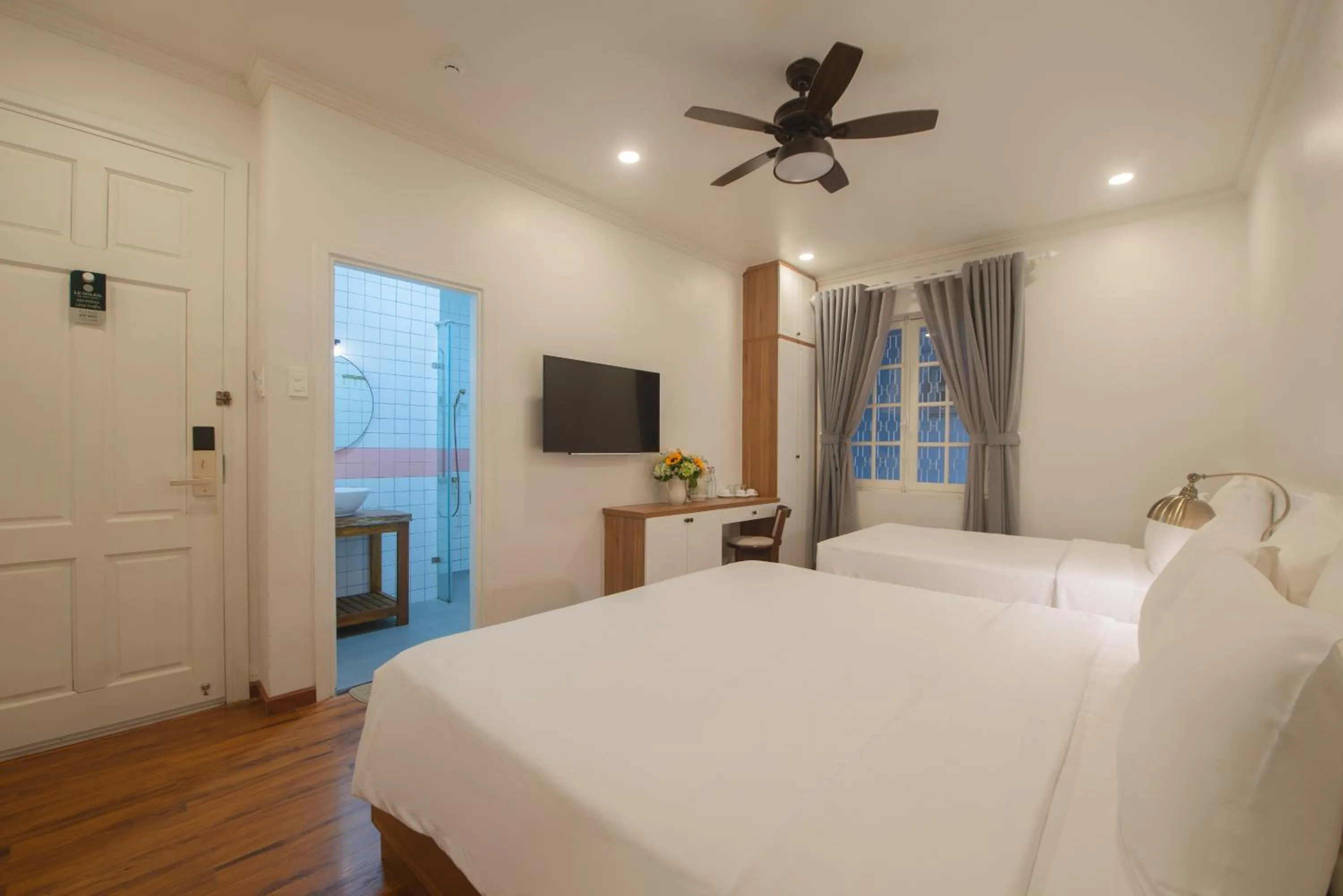 Bed in Le Soleil Boutique Hotel