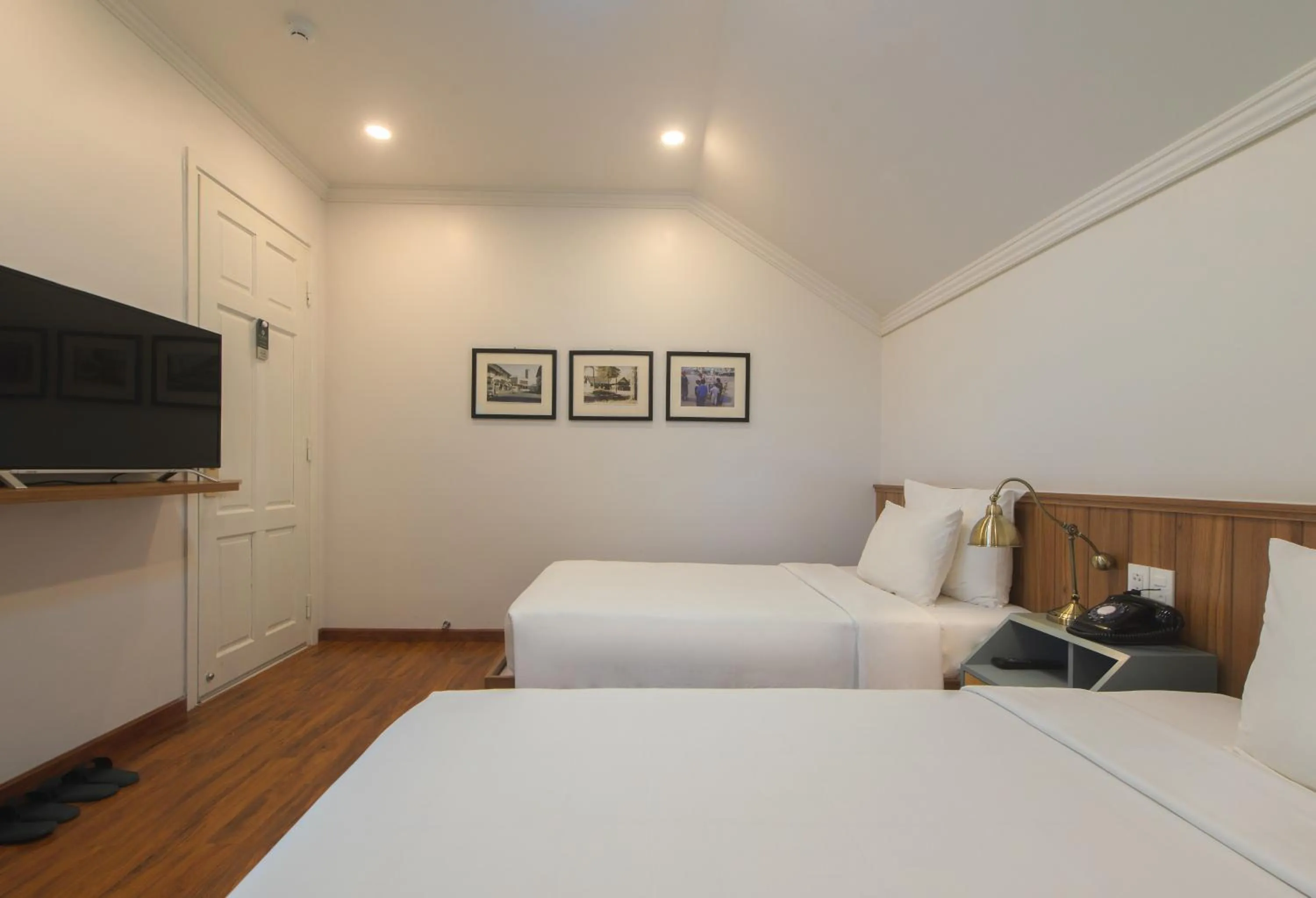 Bed in Le Soleil Boutique Hotel