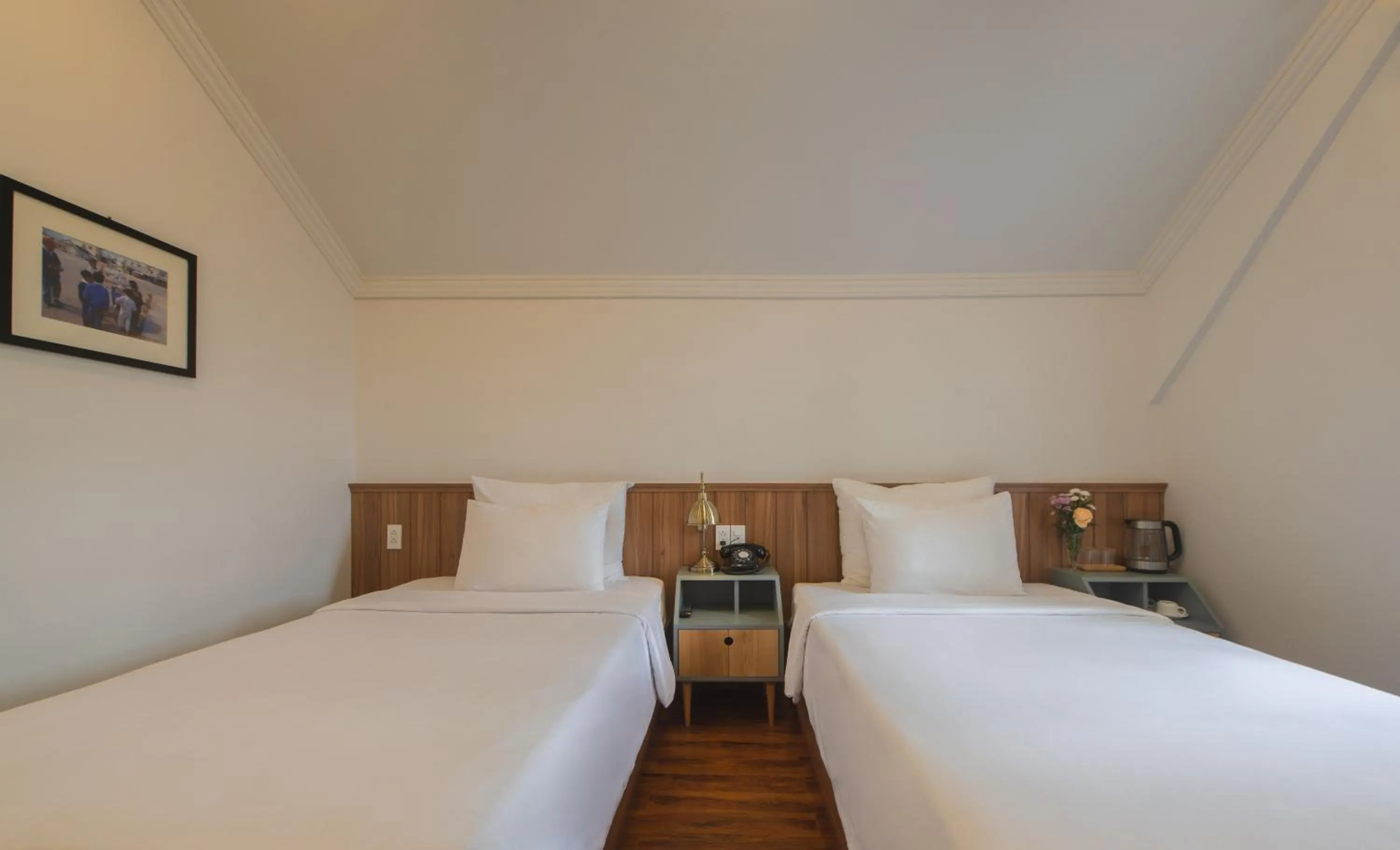 Bed in Le Soleil Boutique Hotel