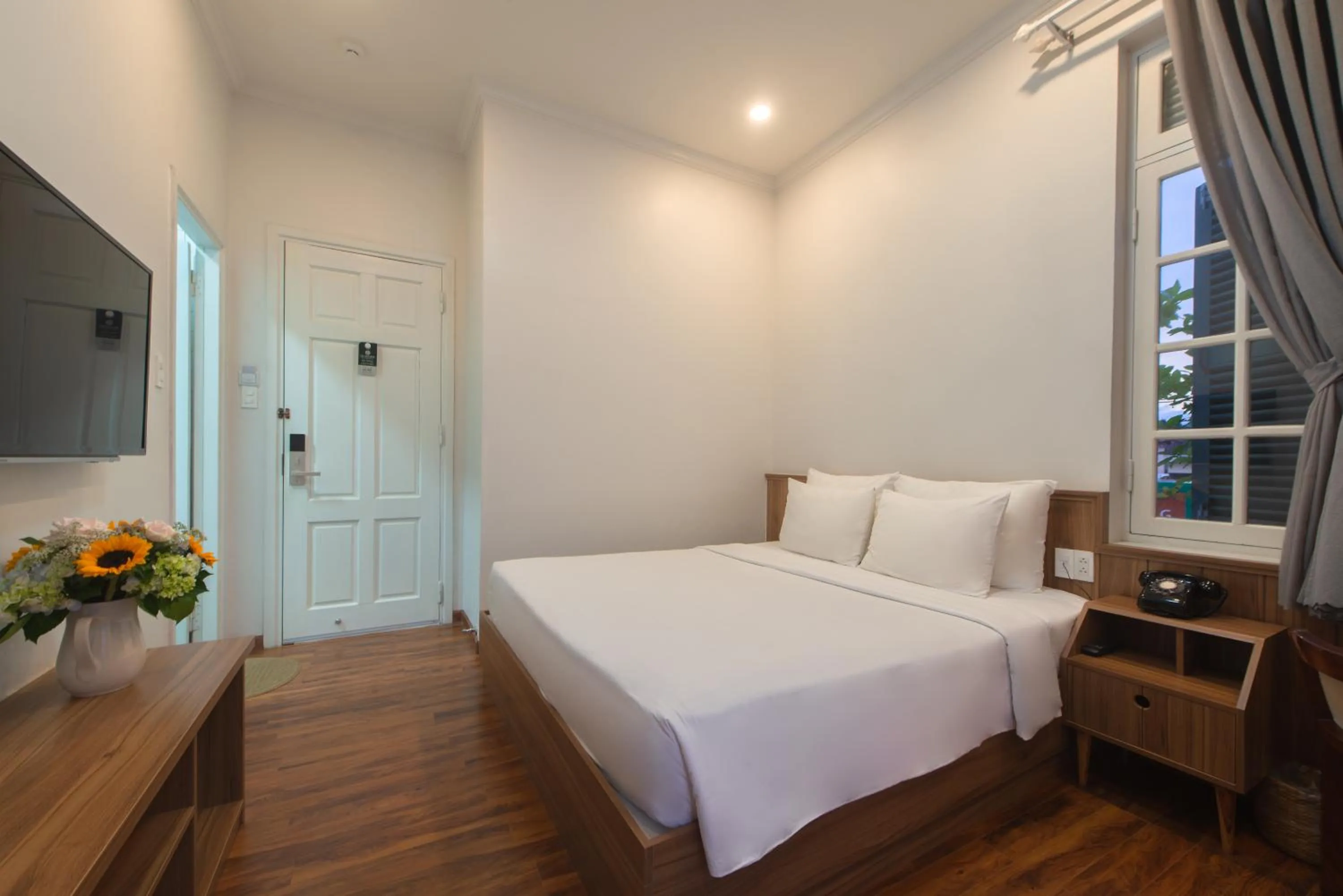 Bed in Le Soleil Boutique Hotel