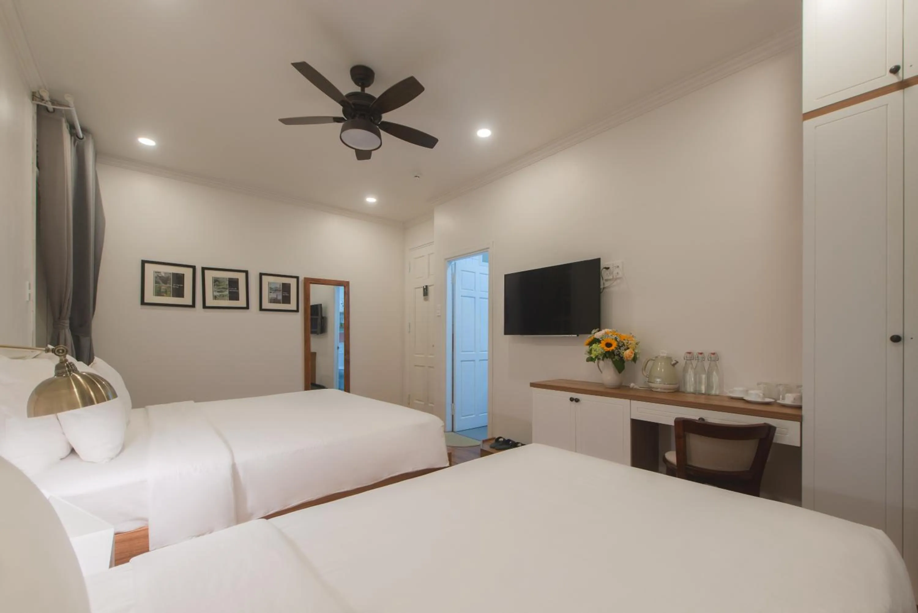 Bed in Le Soleil Boutique Hotel