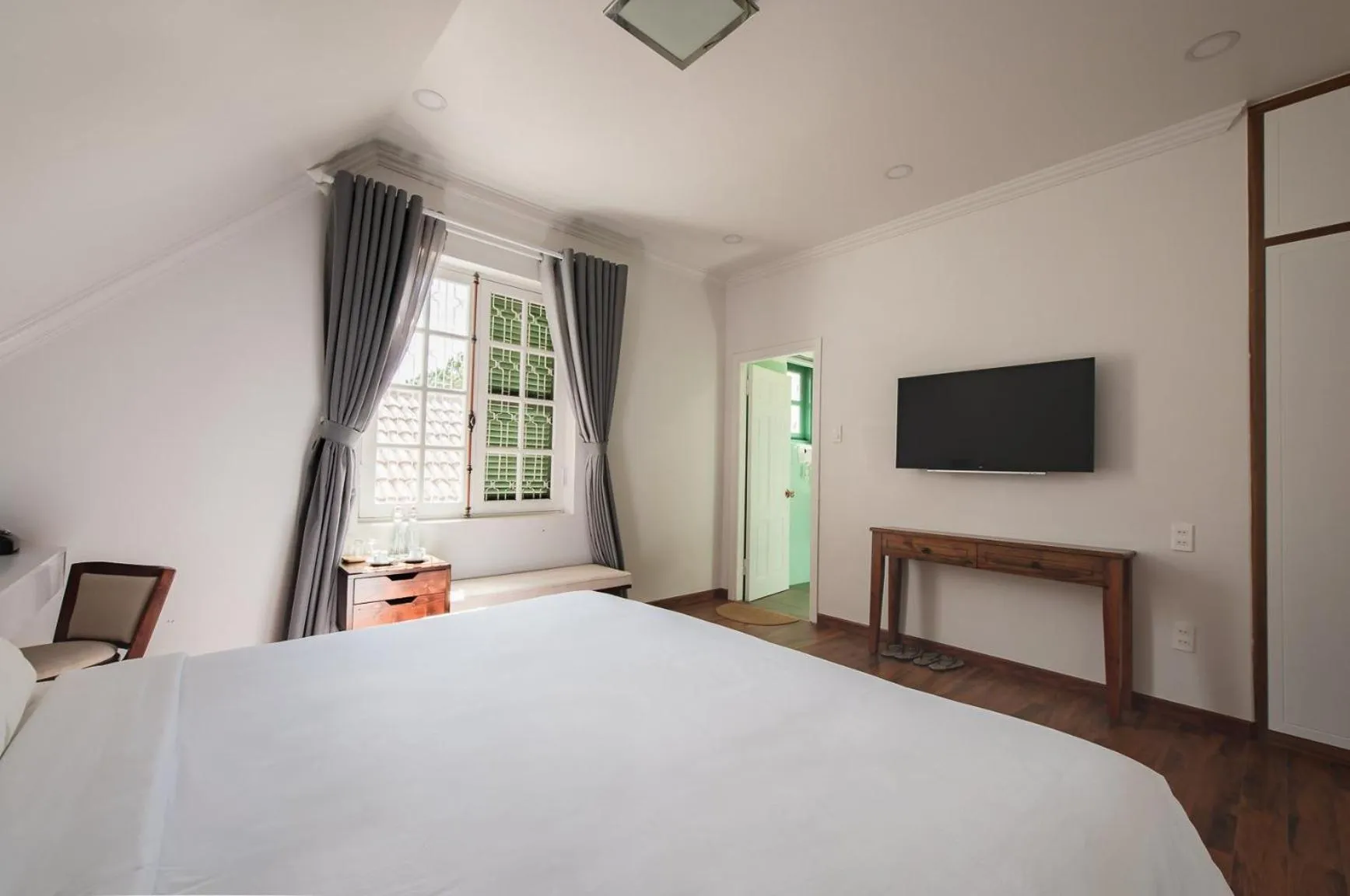 Bed in Le Soleil Boutique Hotel