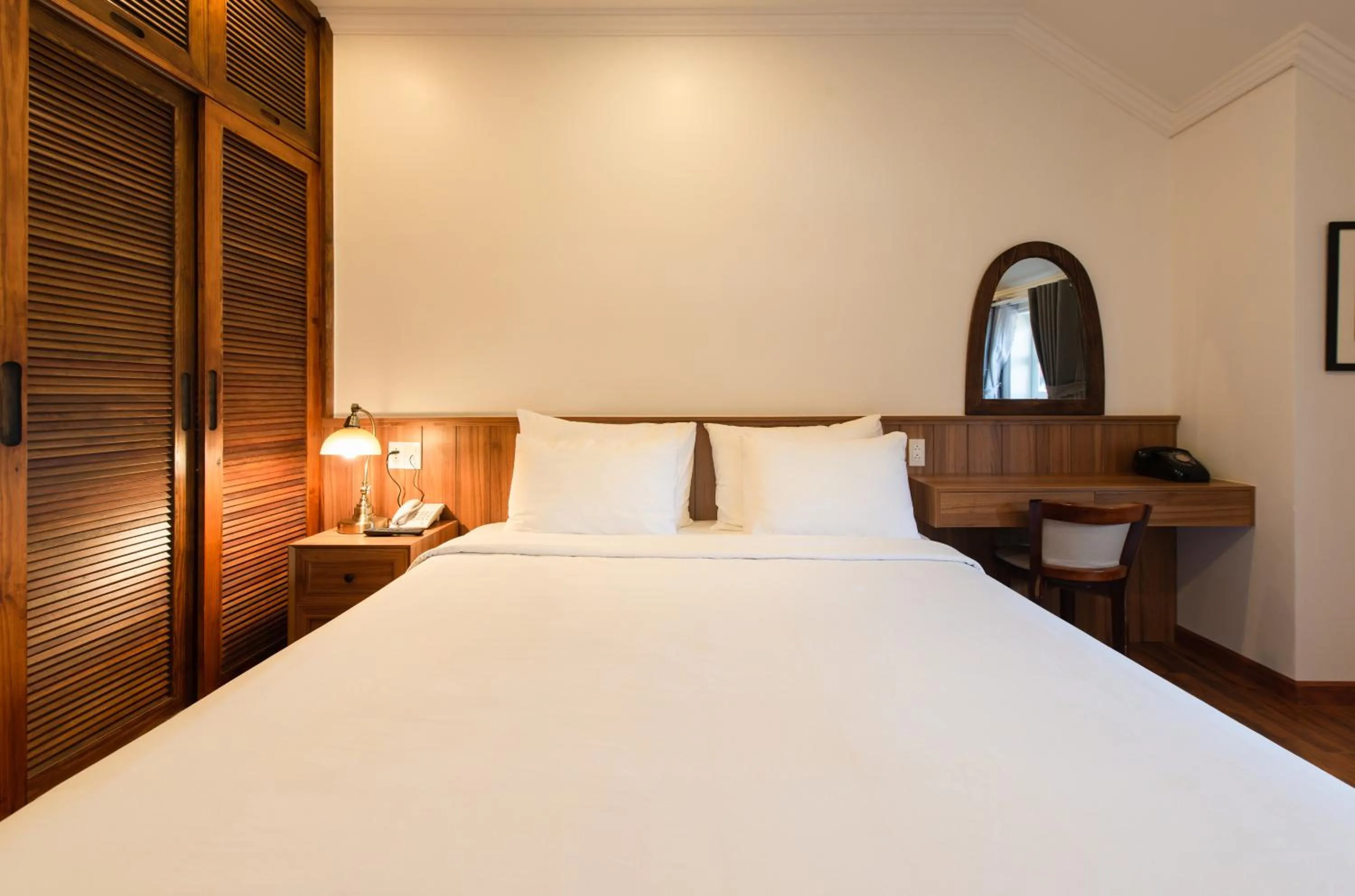 Bed in Le Soleil Boutique Hotel