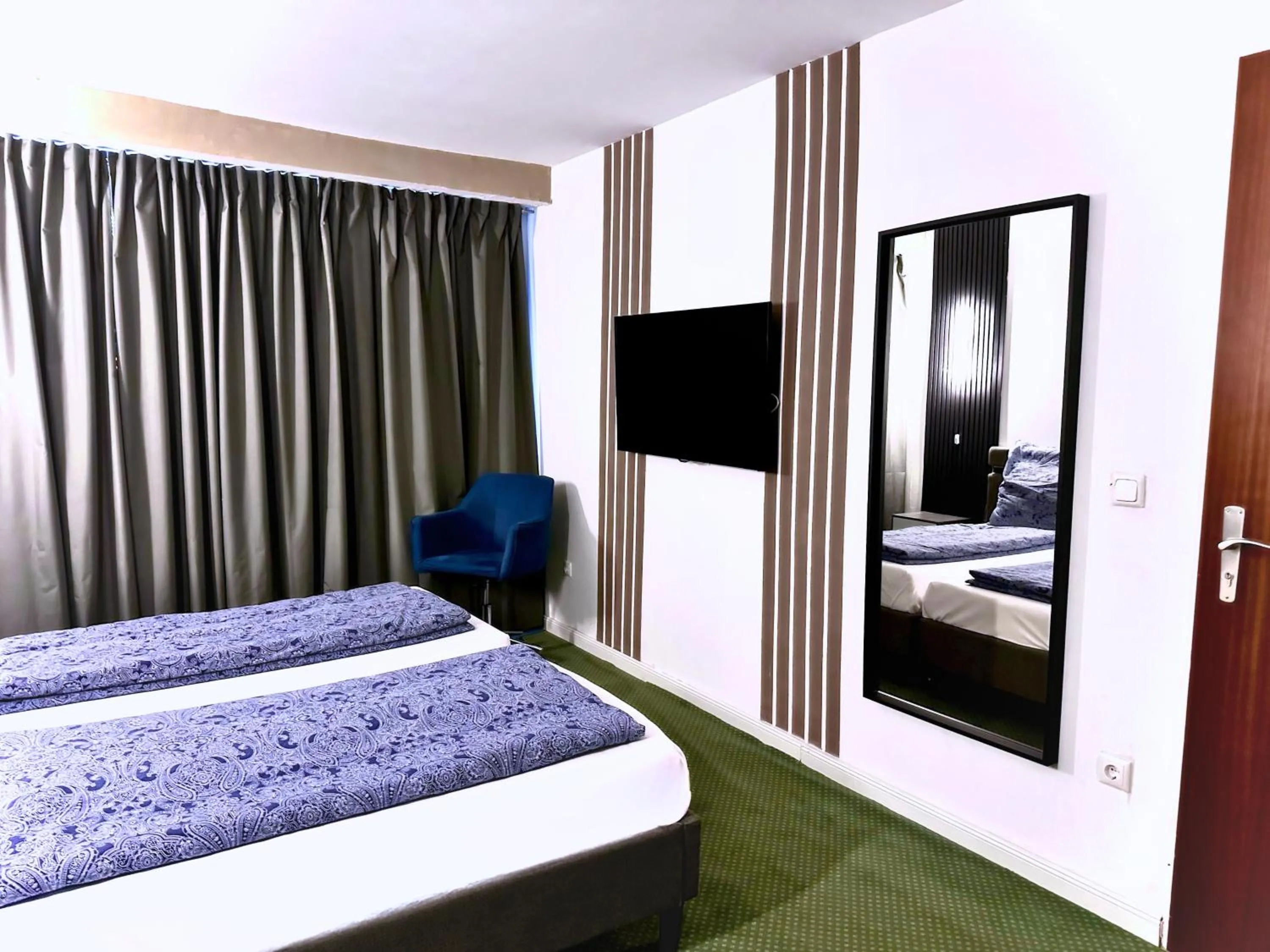 Bed in Hotel Hamburg Inn