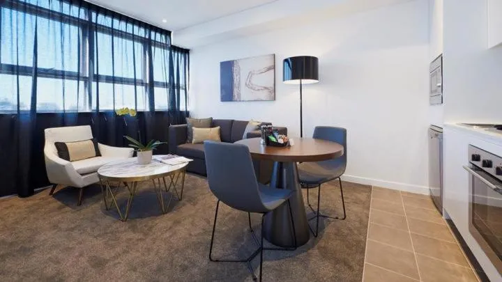 Living room in KOZYGURU Chatswood Luxury Studio NCH088-720