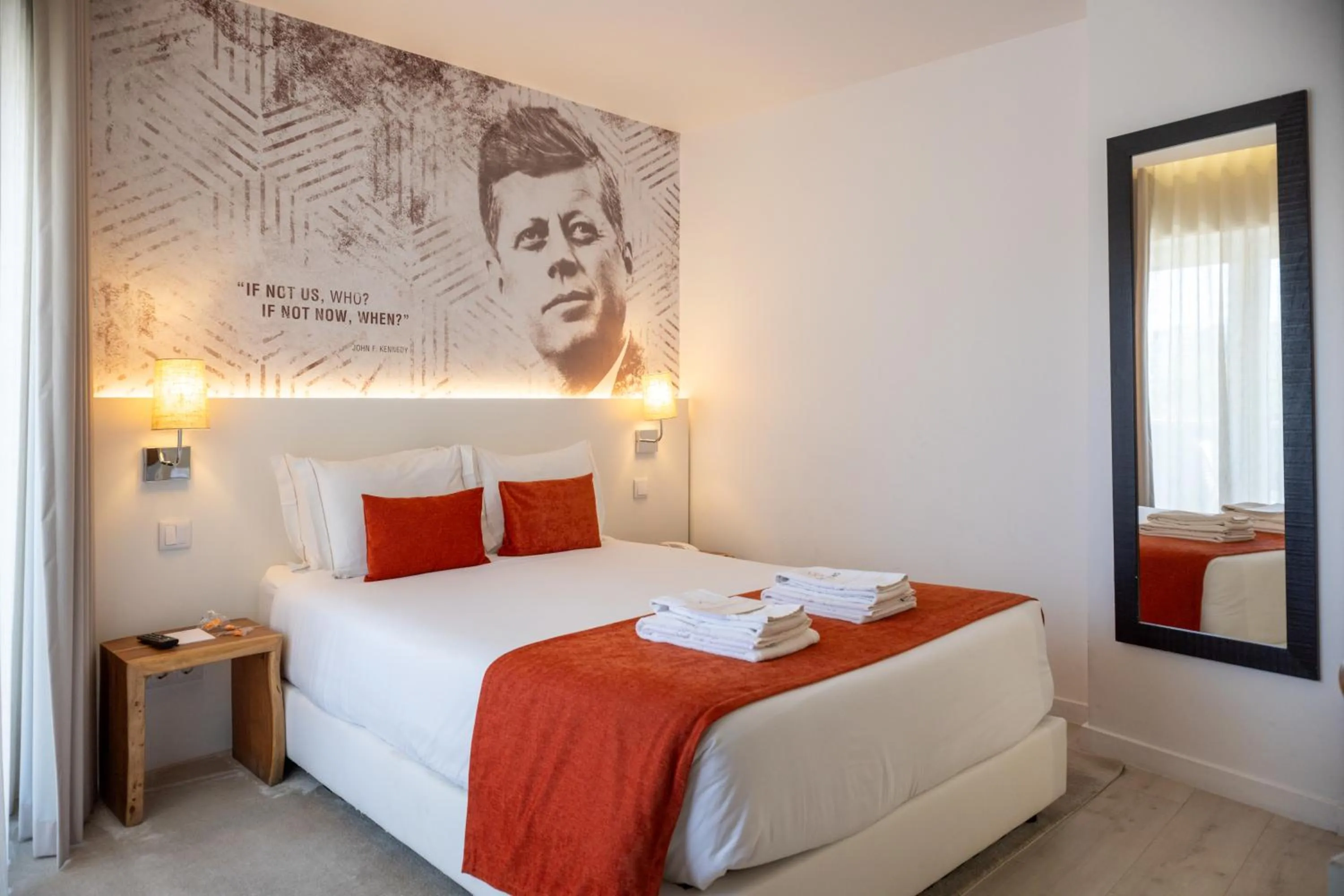 Bed in The ICONS Lisbon Hotel