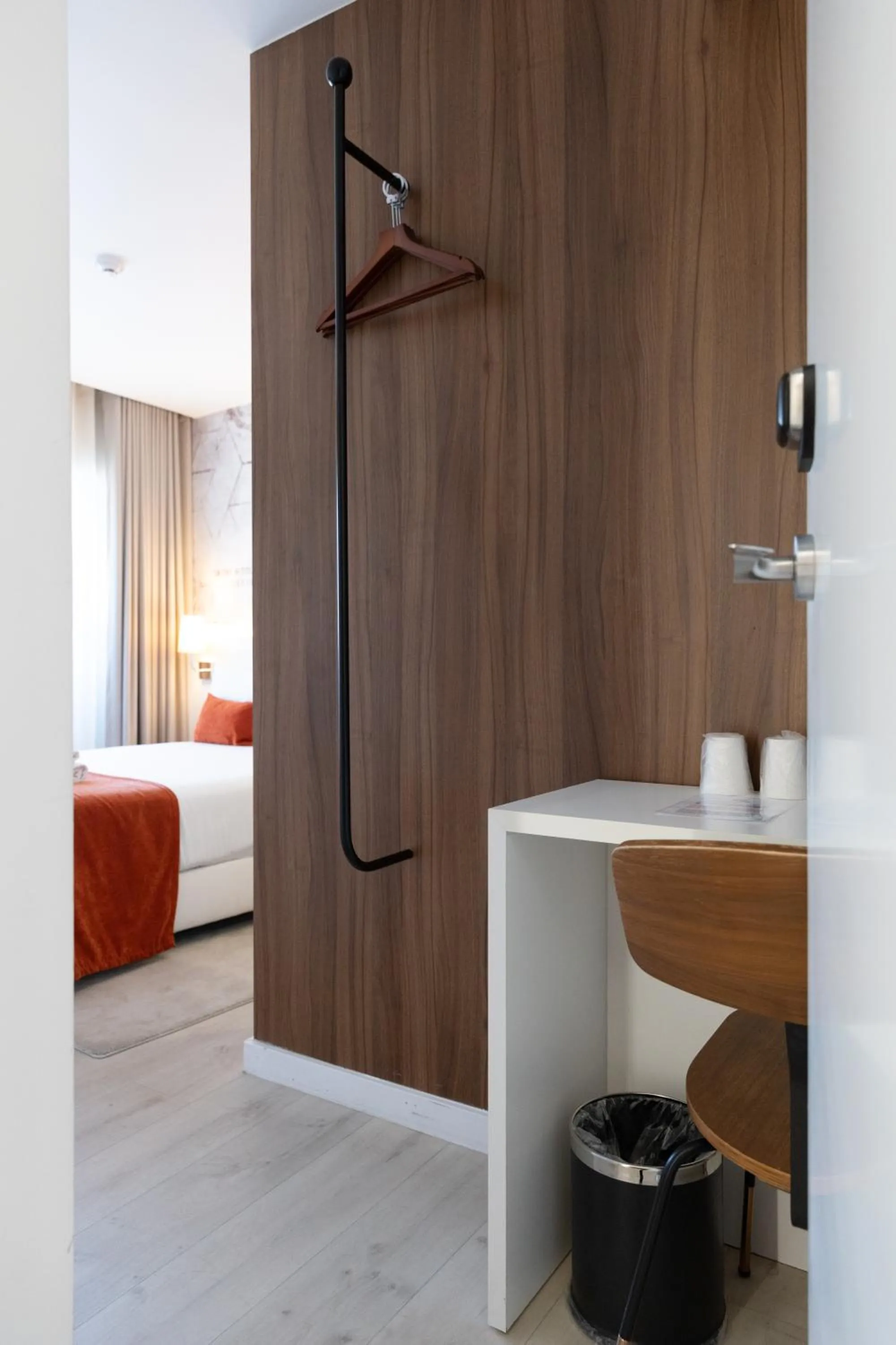 Bed in The ICONS Lisbon Hotel