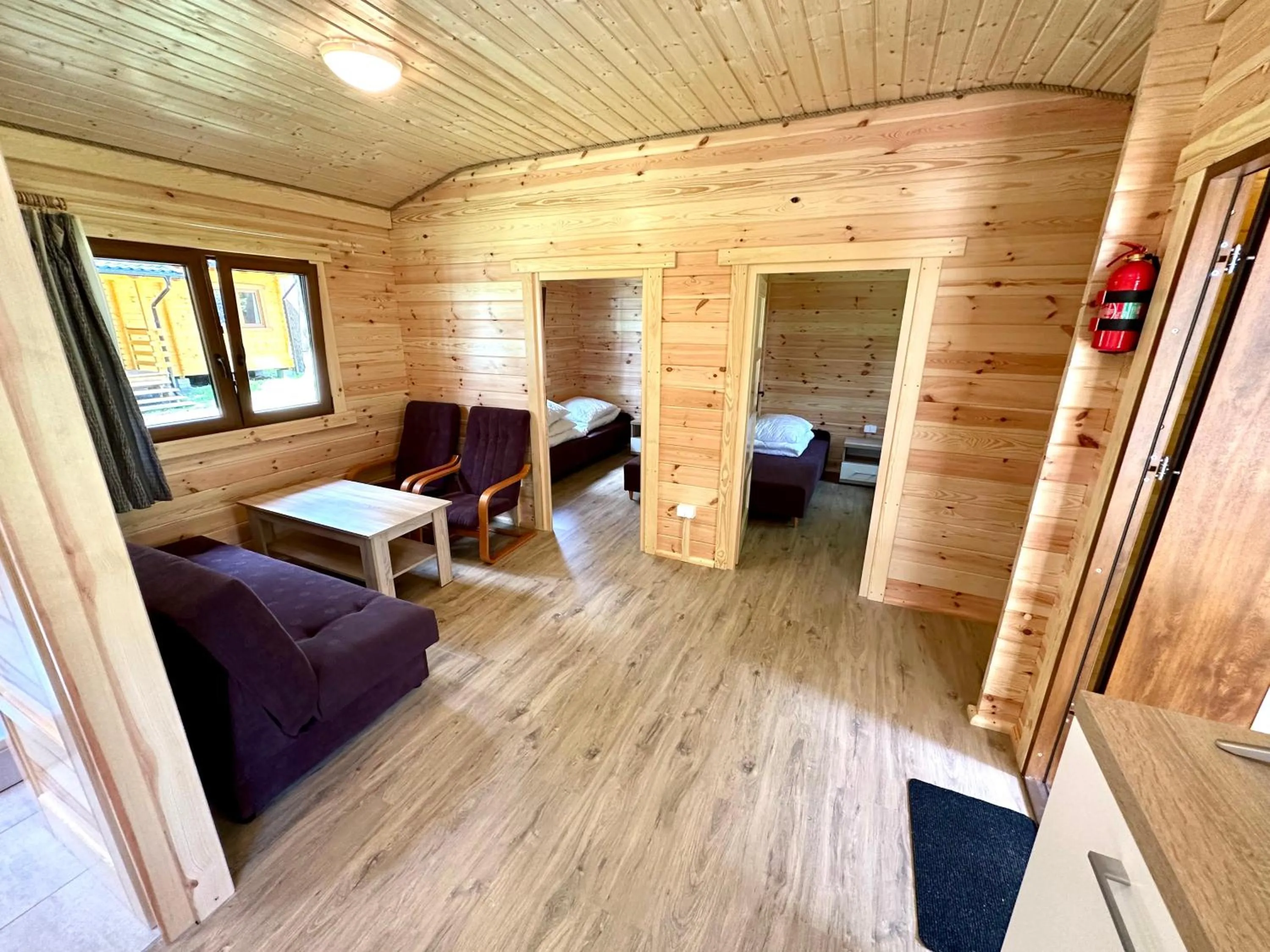 Living room, Bed in Ośrodek Wypoczynkowy Jeziornik