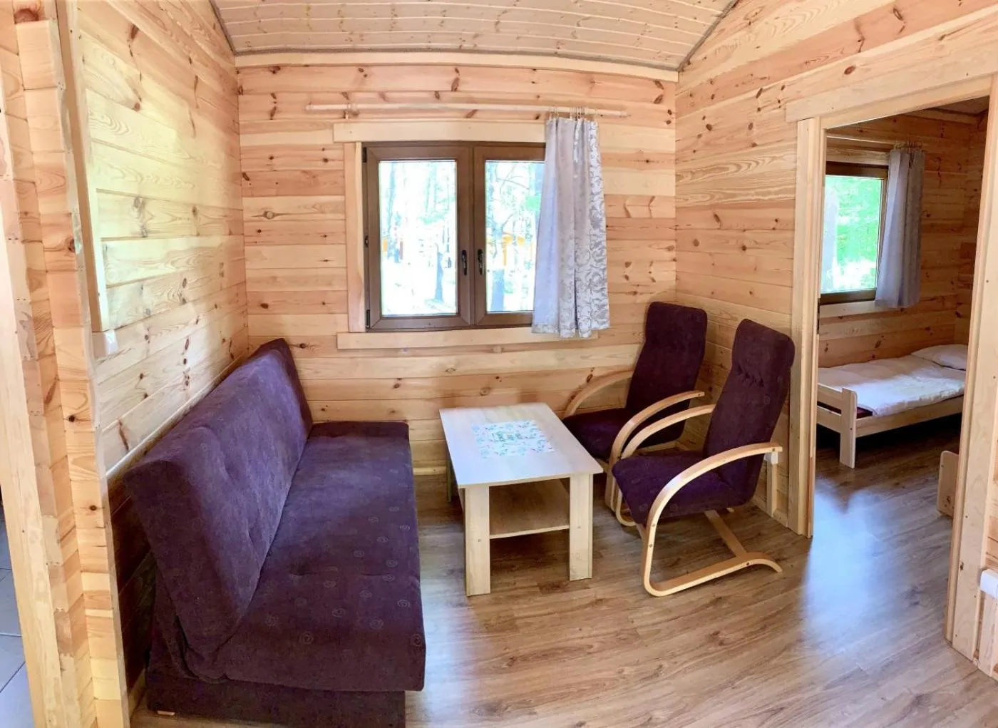 Living room, Bed in Ośrodek Wypoczynkowy Jeziornik