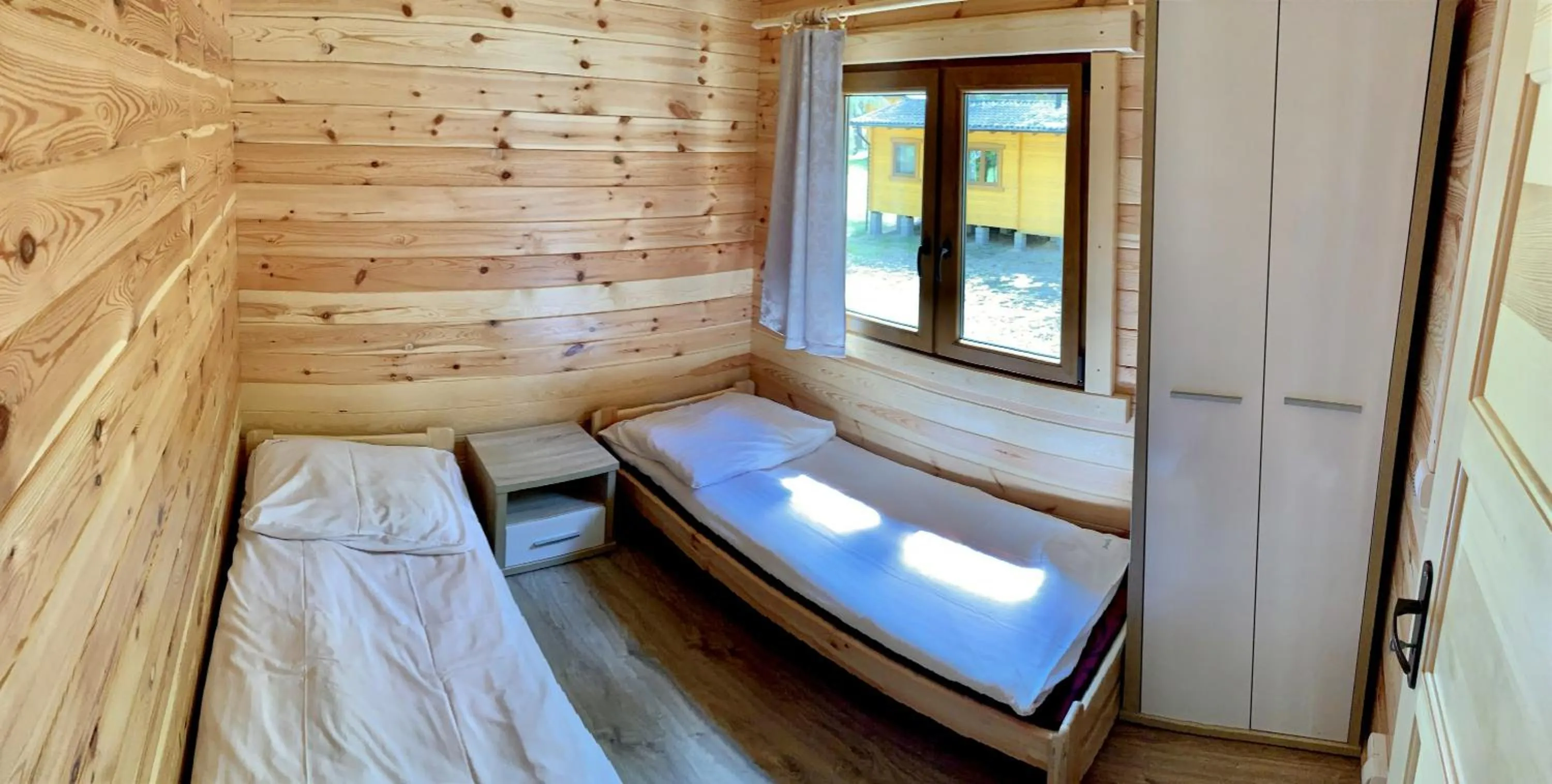 Bed in Ośrodek Wypoczynkowy Jeziornik