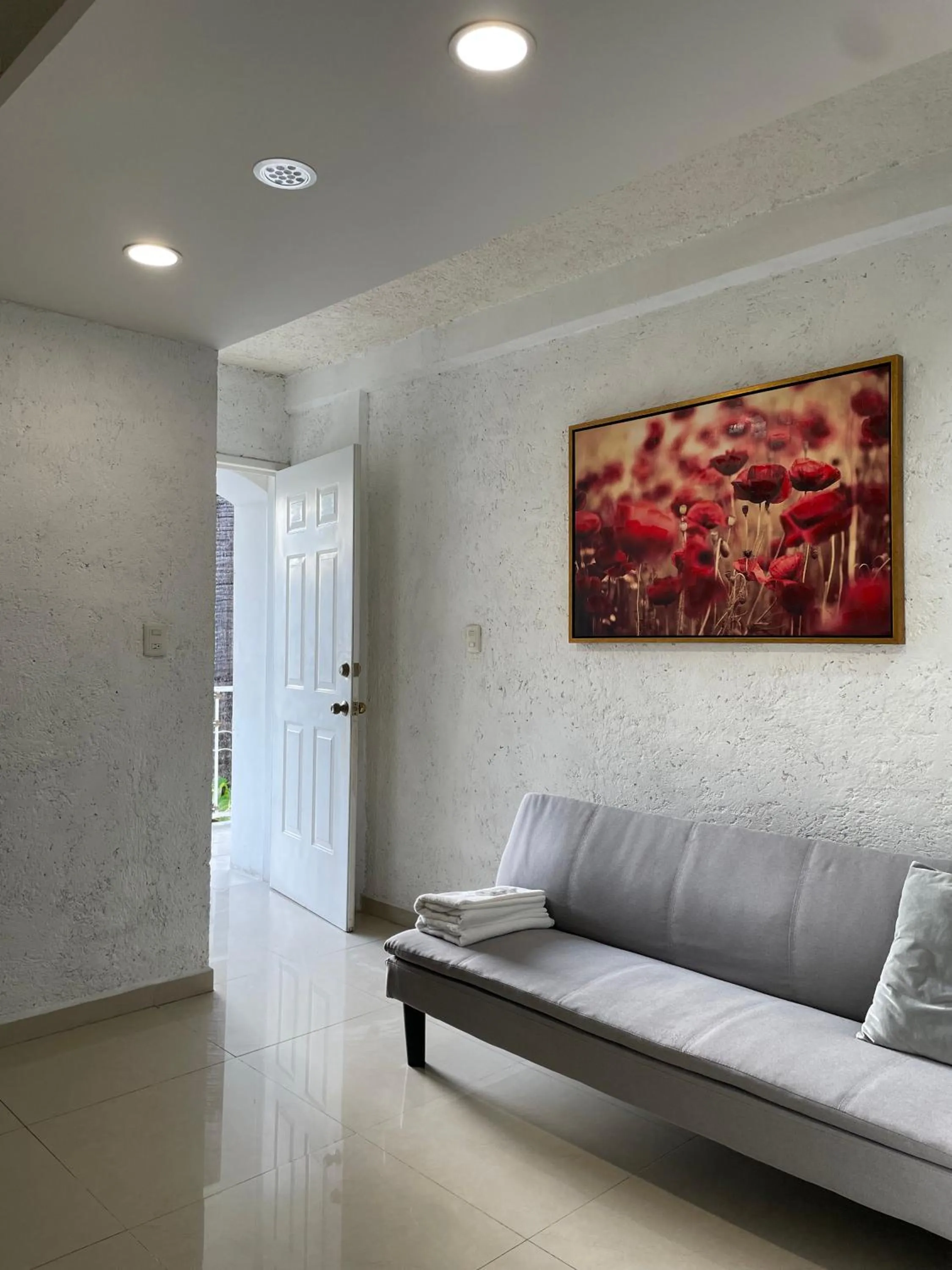 Living room in Hotel Dos Mundos, Isla Cozumel