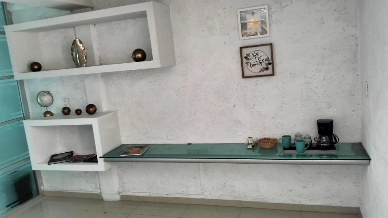 Living room in Hotel Dos Mundos, Isla Cozumel