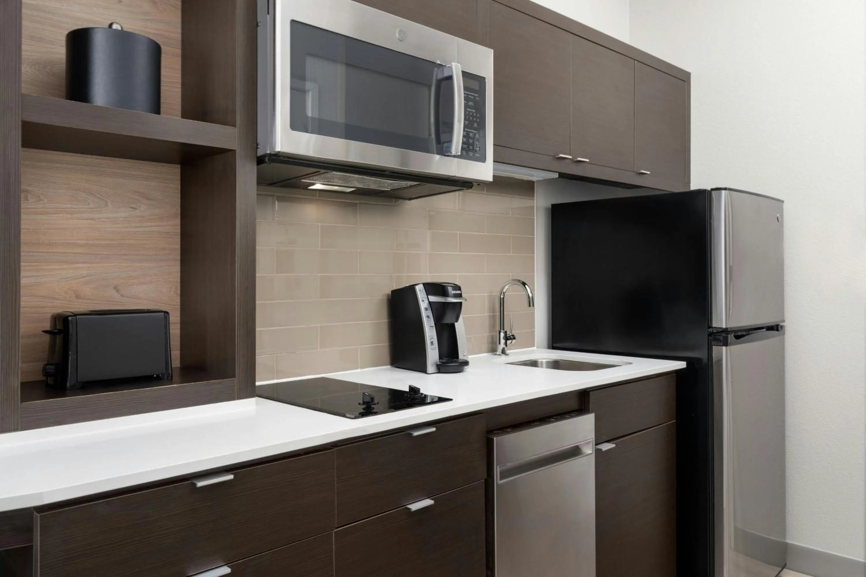 Kitchen or kitchenette in TownePlace Suites by Marriott Houston Hobby Airport