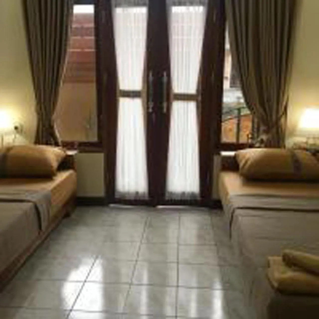 Bed in Bulan Bali Guest House