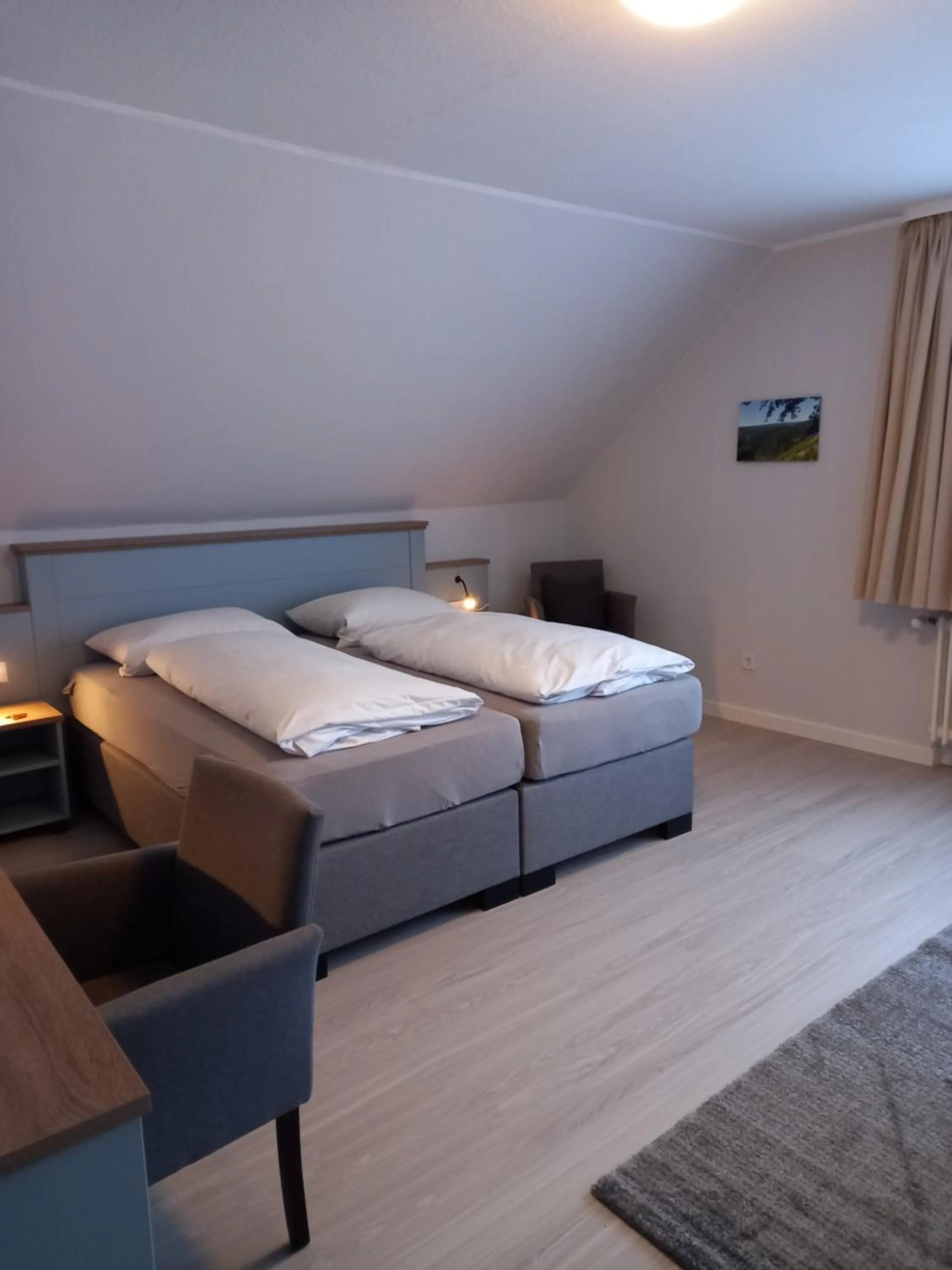 Bed in Mein Vierjahreszeiten Hotel Garni Superior