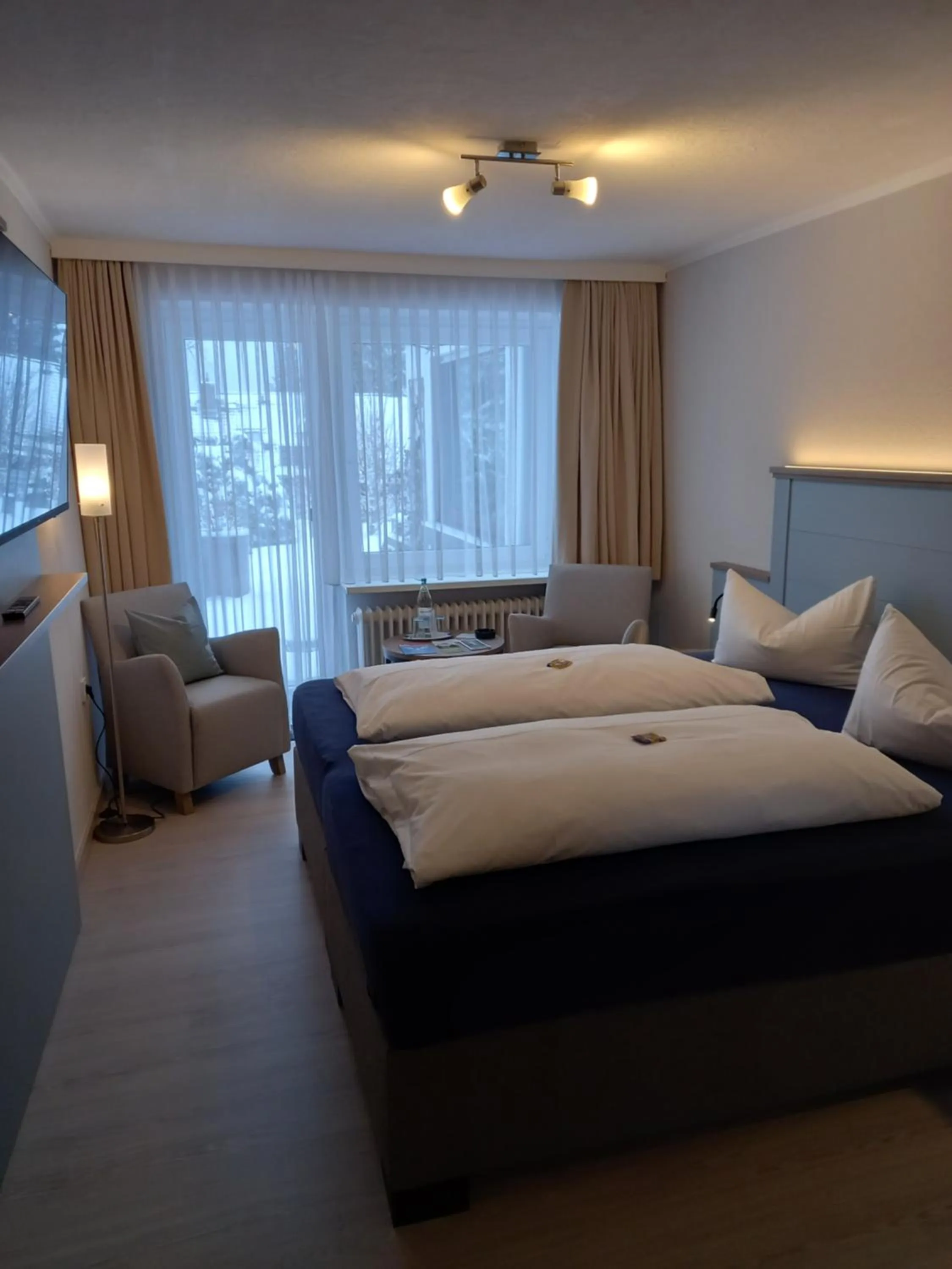 Bed in Mein Vierjahreszeiten Hotel Garni Superior