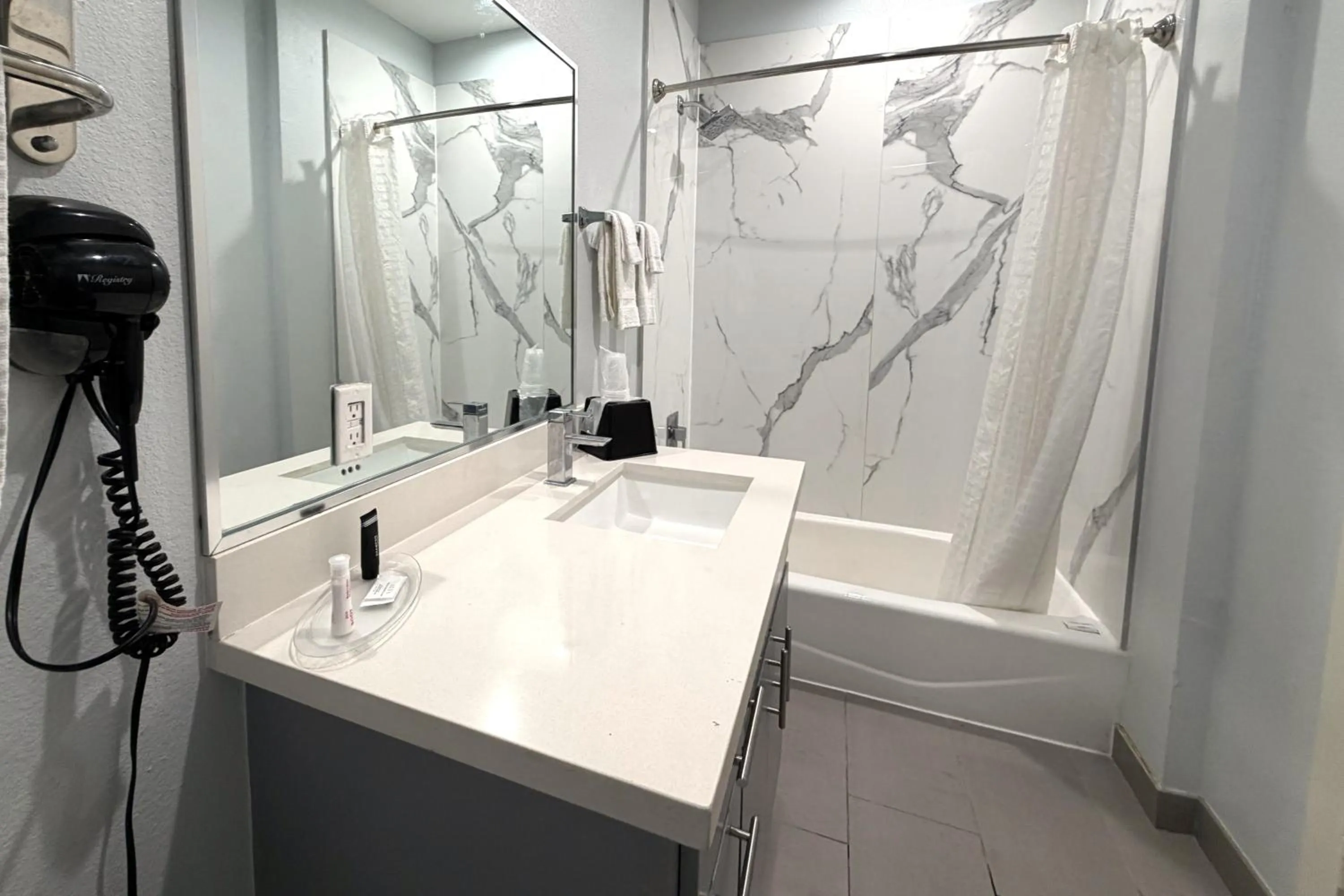 Bathroom in Hotel Royale IAH Airport North Houston I-45