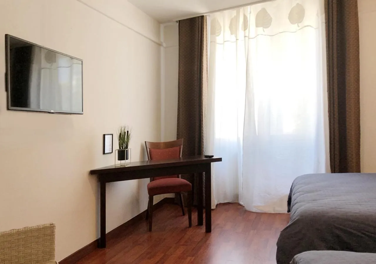 Bed in L'EMBLEME - BOUTIQUE HOTEL