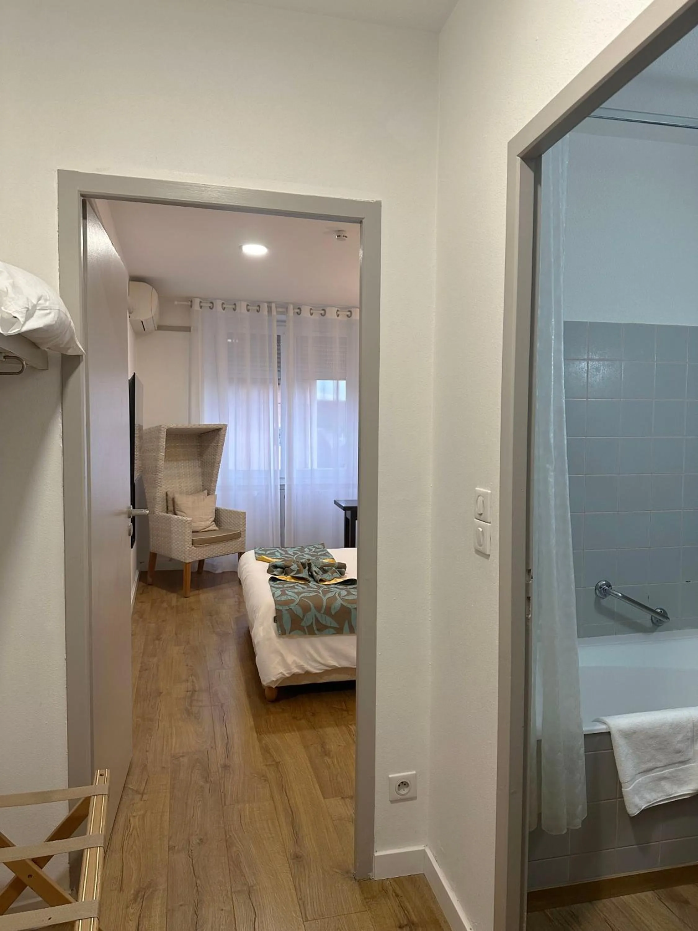 Bed in L'EMBLEME - BOUTIQUE HOTEL