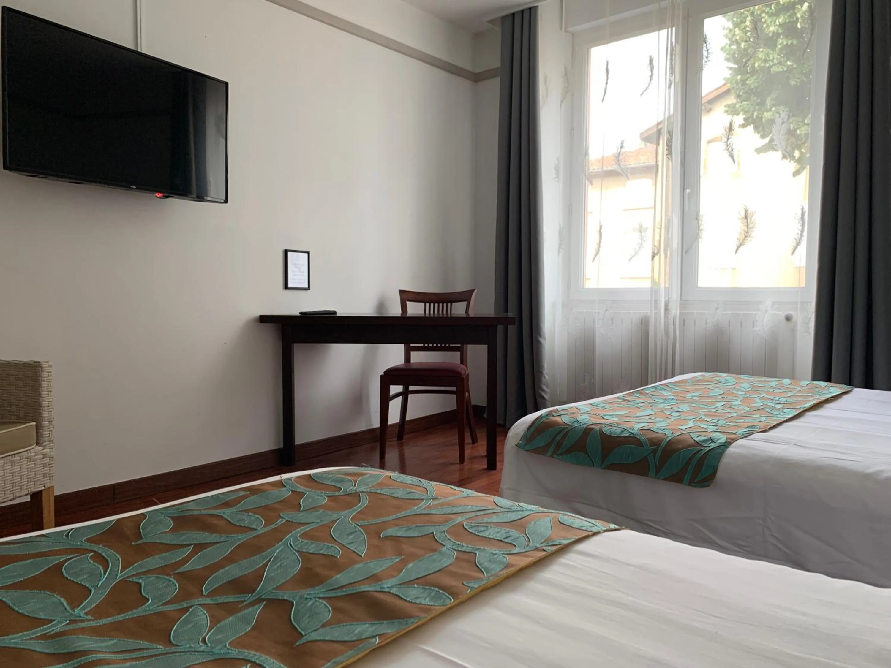 Bed in L'EMBLEME - BOUTIQUE HOTEL