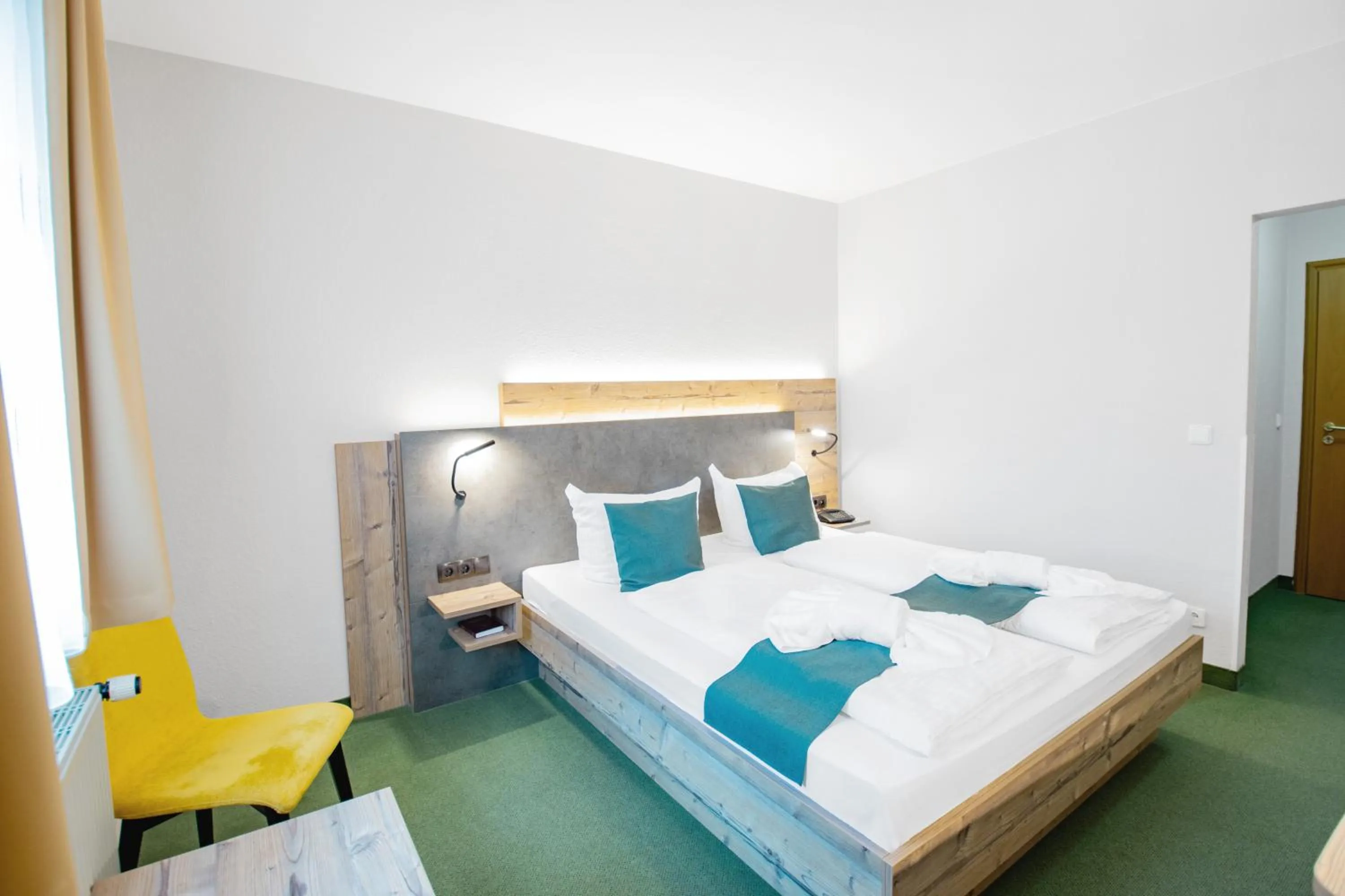 Photo of the whole room, Bed in Ferien Hotel Spreewald