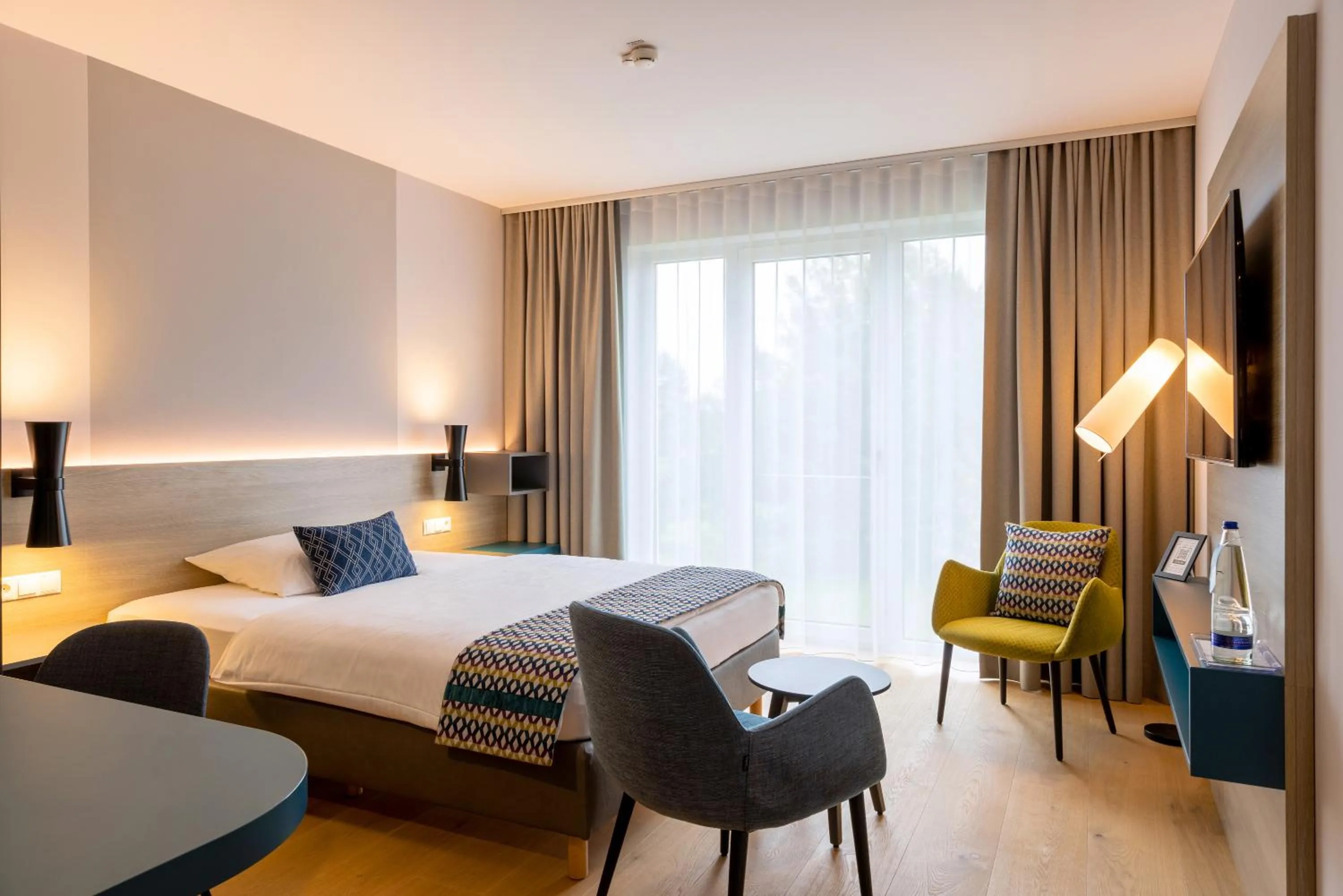 Photo of the whole room, Bed in Parkhotel Maximilian Ottobeuren