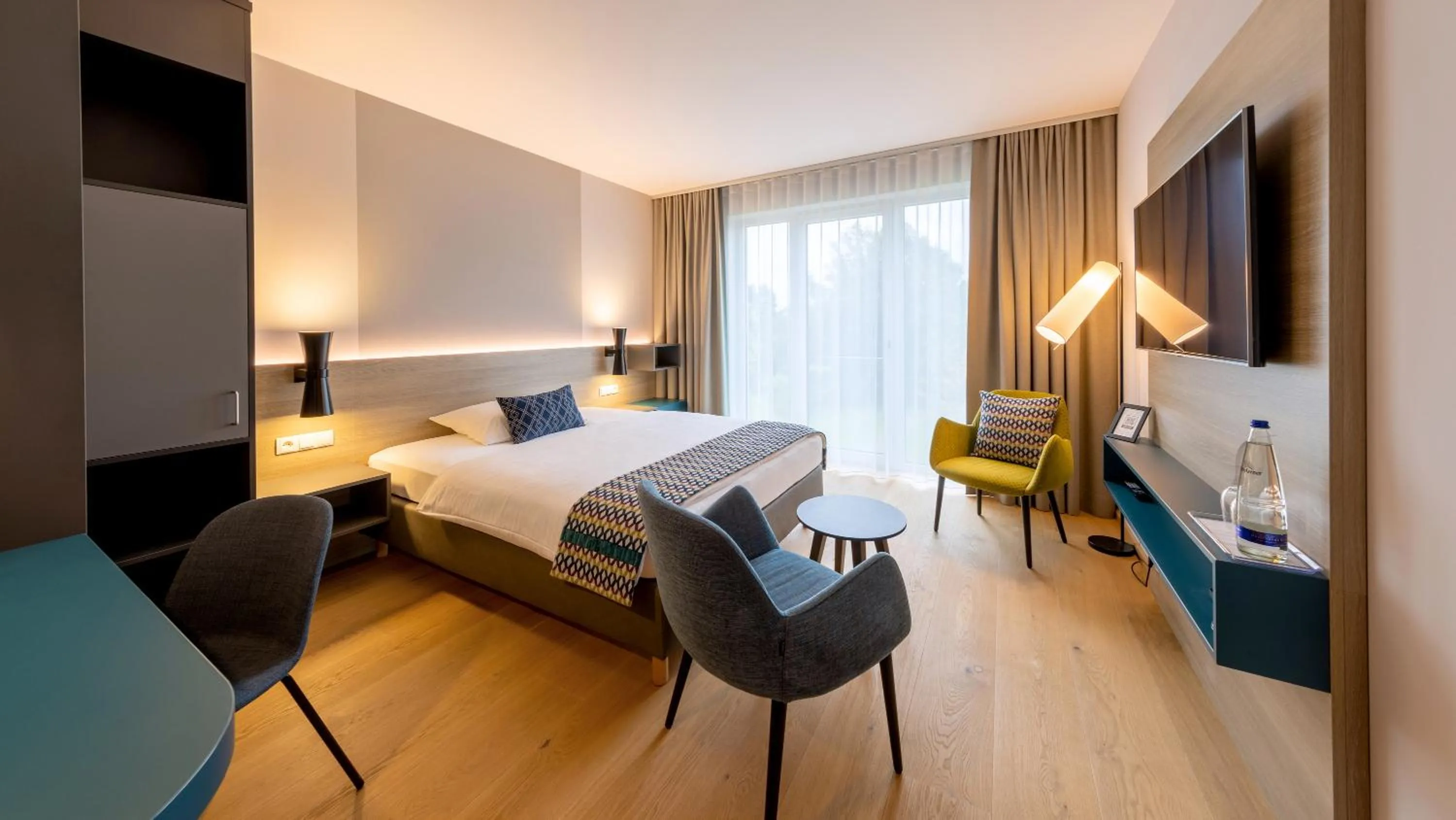 Photo of the whole room, Bed in Parkhotel Maximilian Ottobeuren