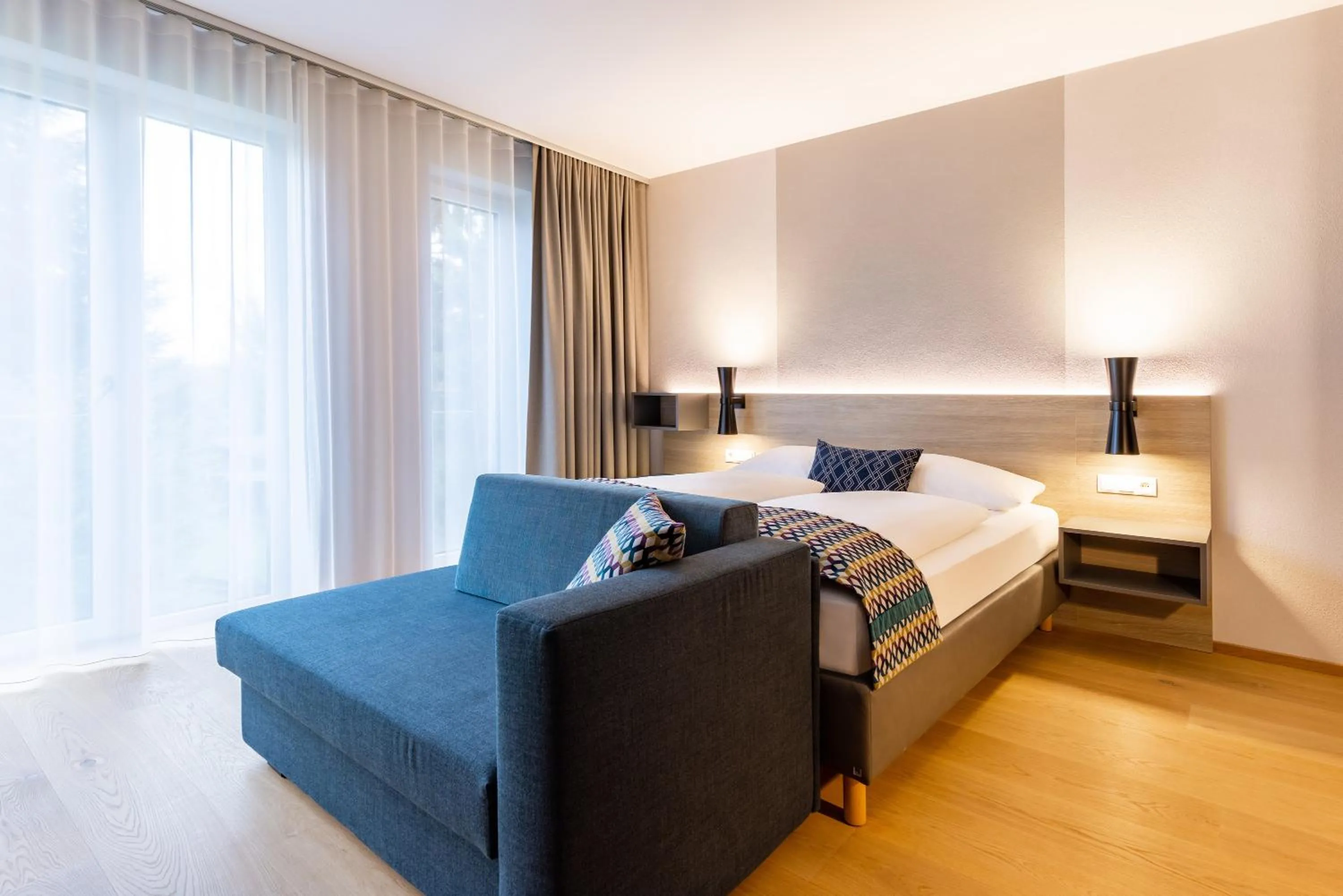 Photo of the whole room, Bed in Parkhotel Maximilian Ottobeuren