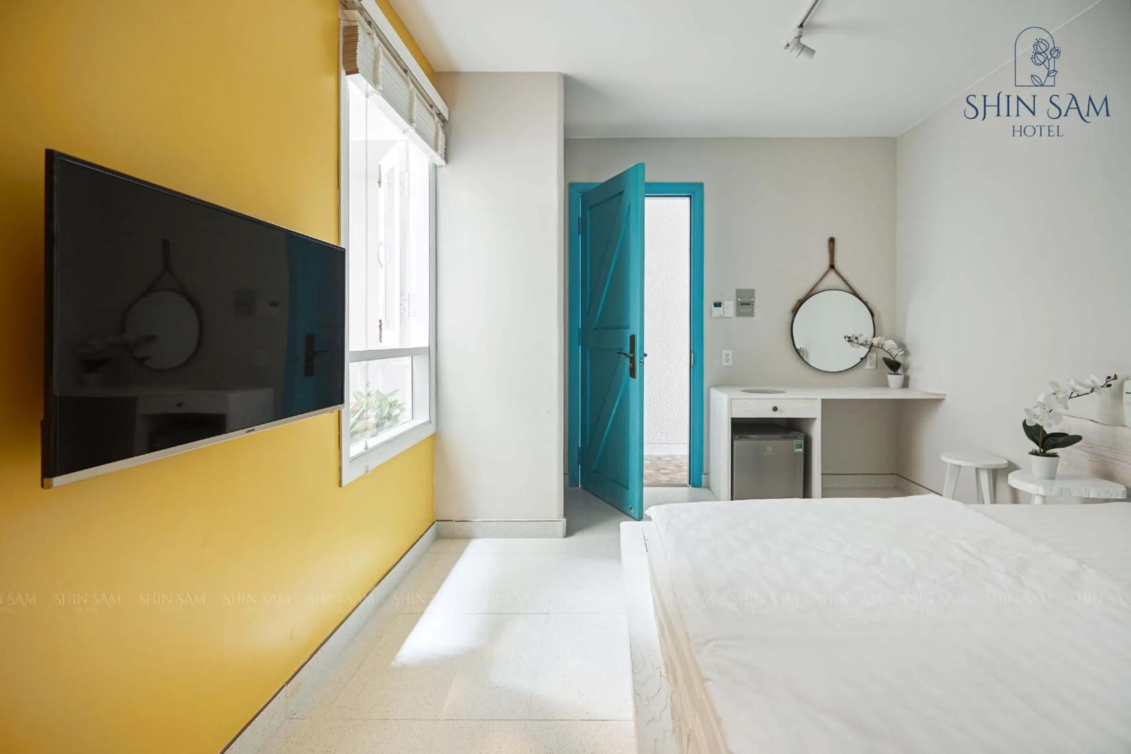 Bed in Shin Sam Boutique Hotel