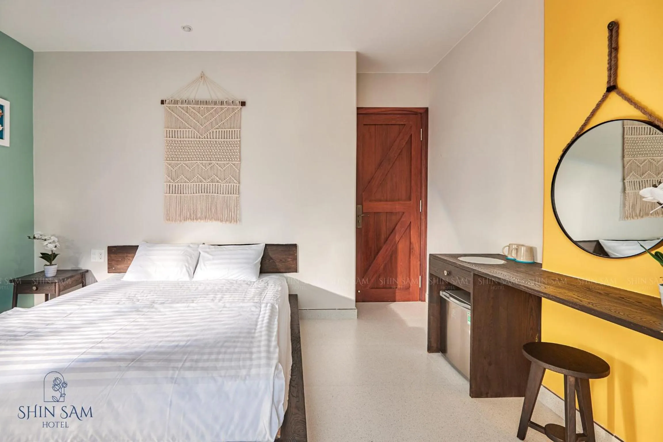 Bed in Shin Sam Boutique Hotel