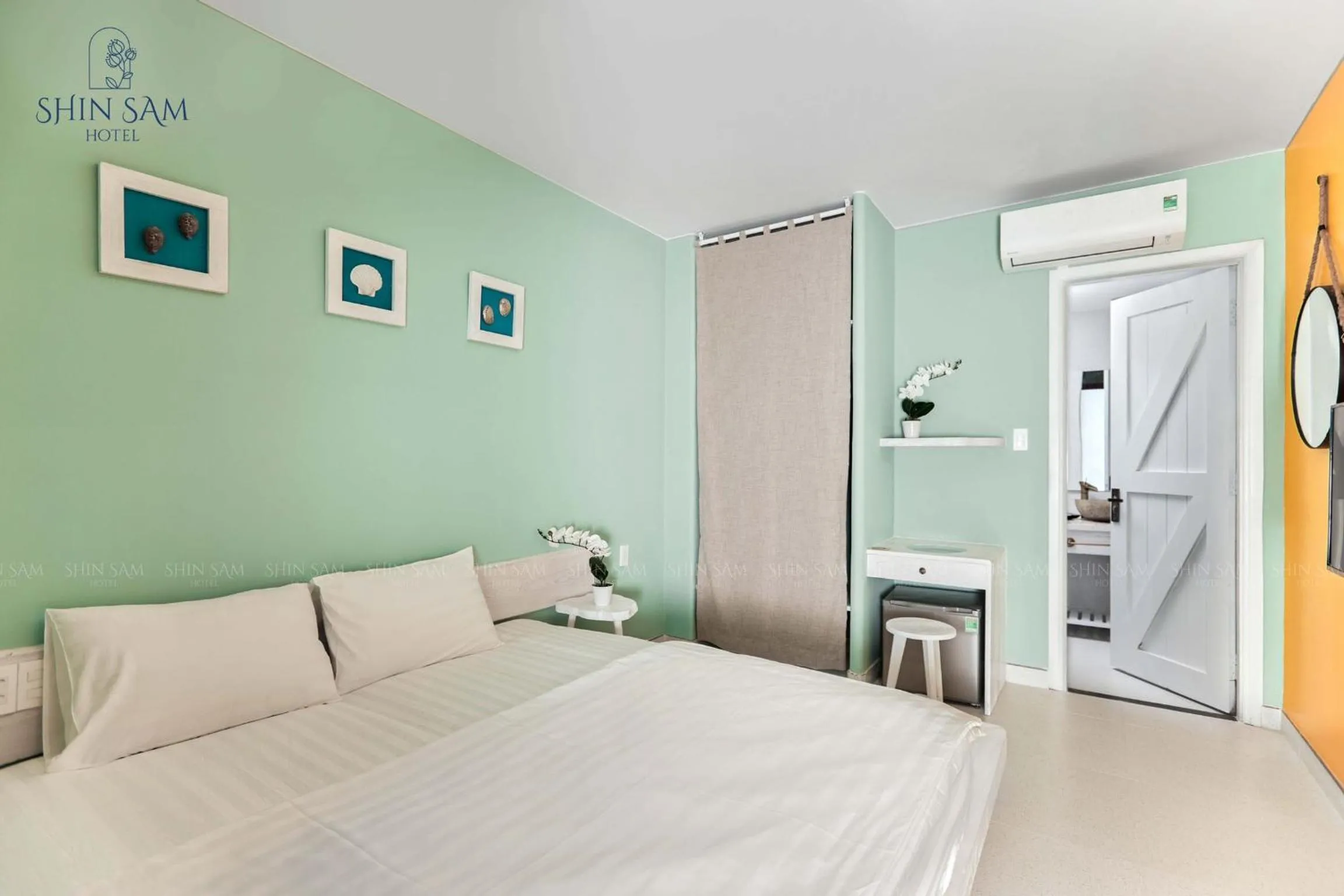 Bed in Shin Sam Boutique Hotel