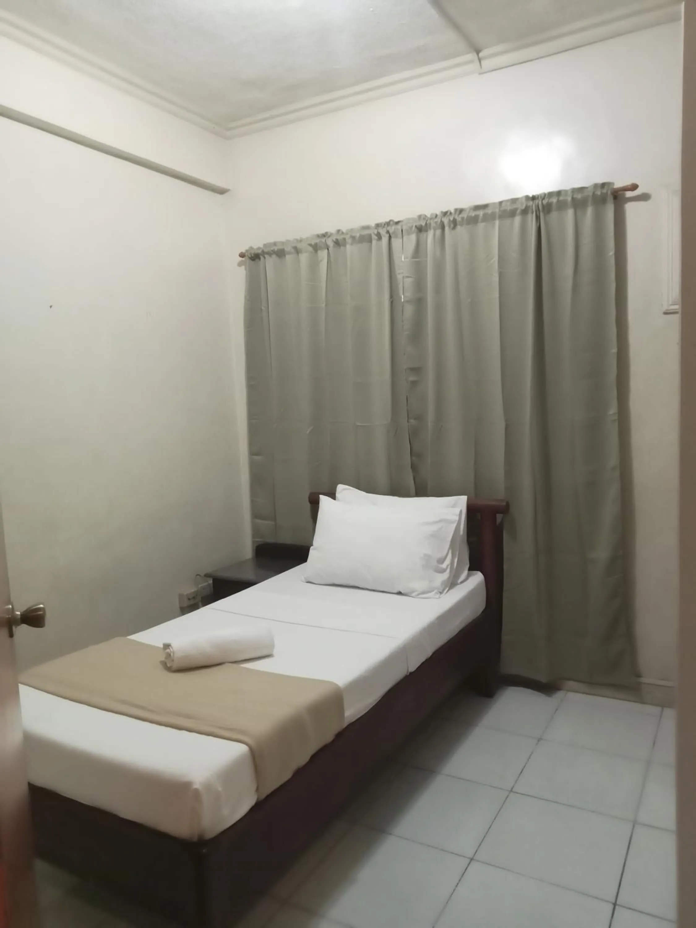 Bedroom, Bed in RedDoorz at Casa Marabella Villamonte Bacolod City