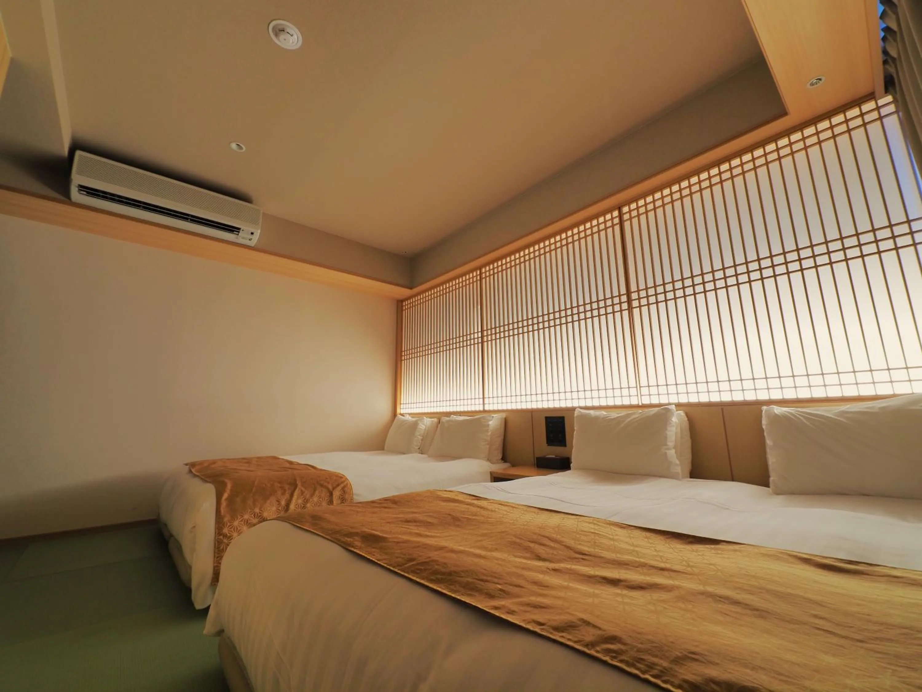 Bed in Henn na Hotel Premier Kyoto Gojo Karasuma -Formerly Watermark Hotel Kyoto-
