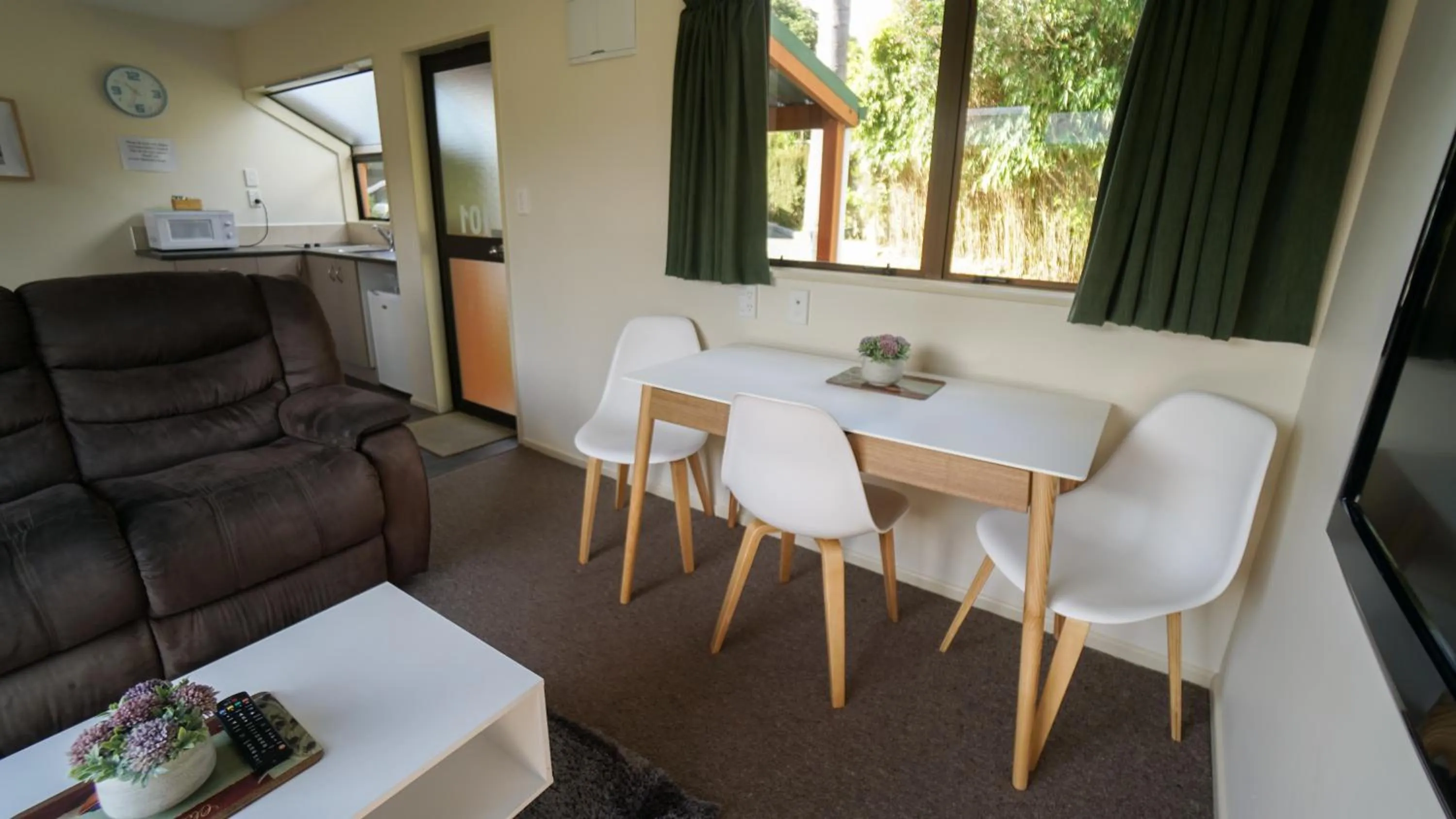Living room in Whangarei Central Holiday Park