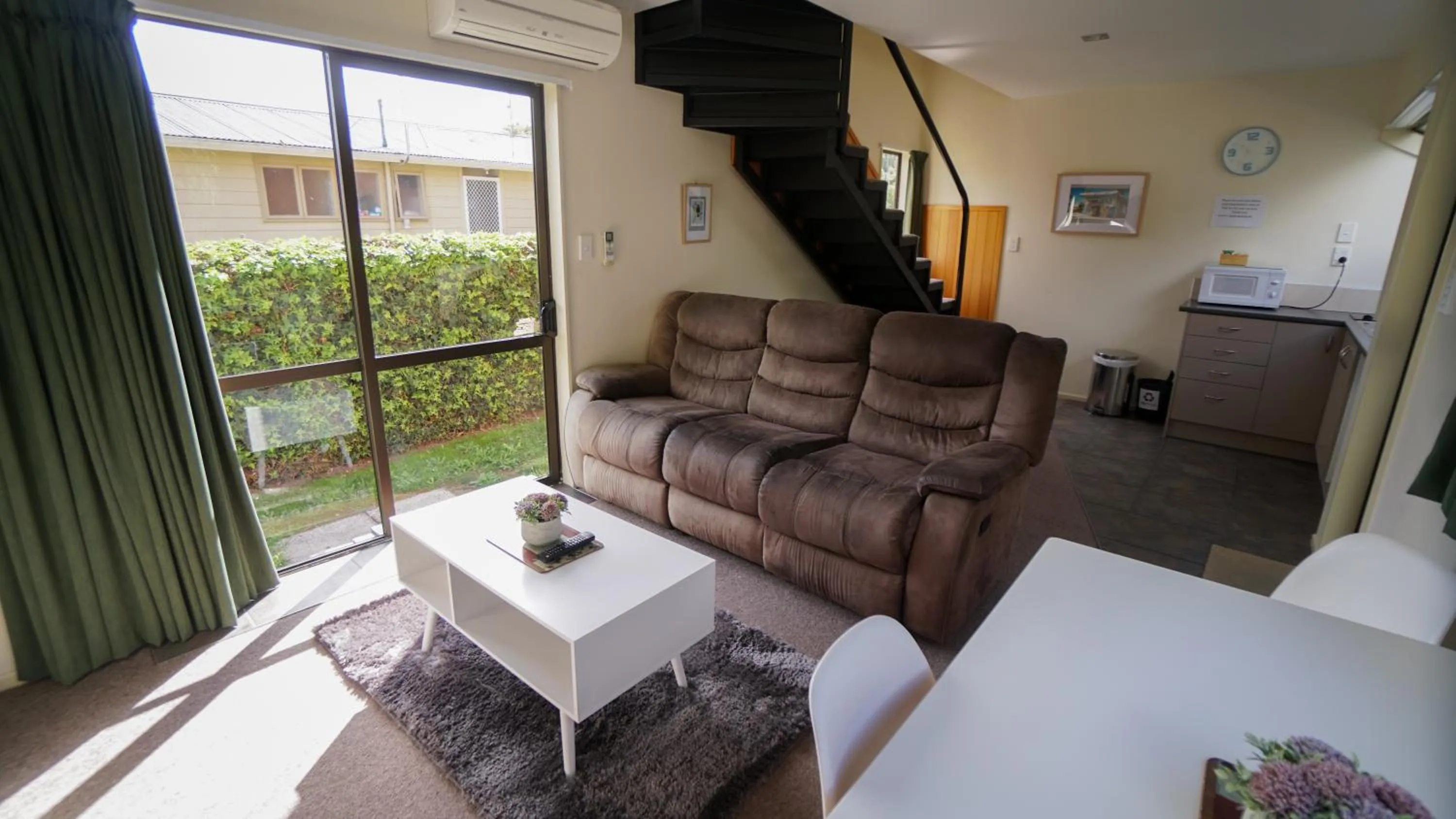 Living room in Whangarei Central Holiday Park