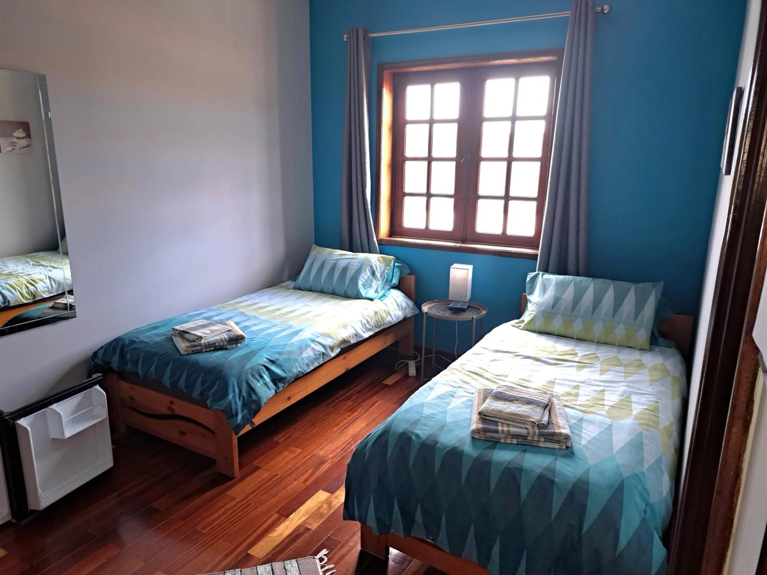 Bed in Beachwalk guesthouse