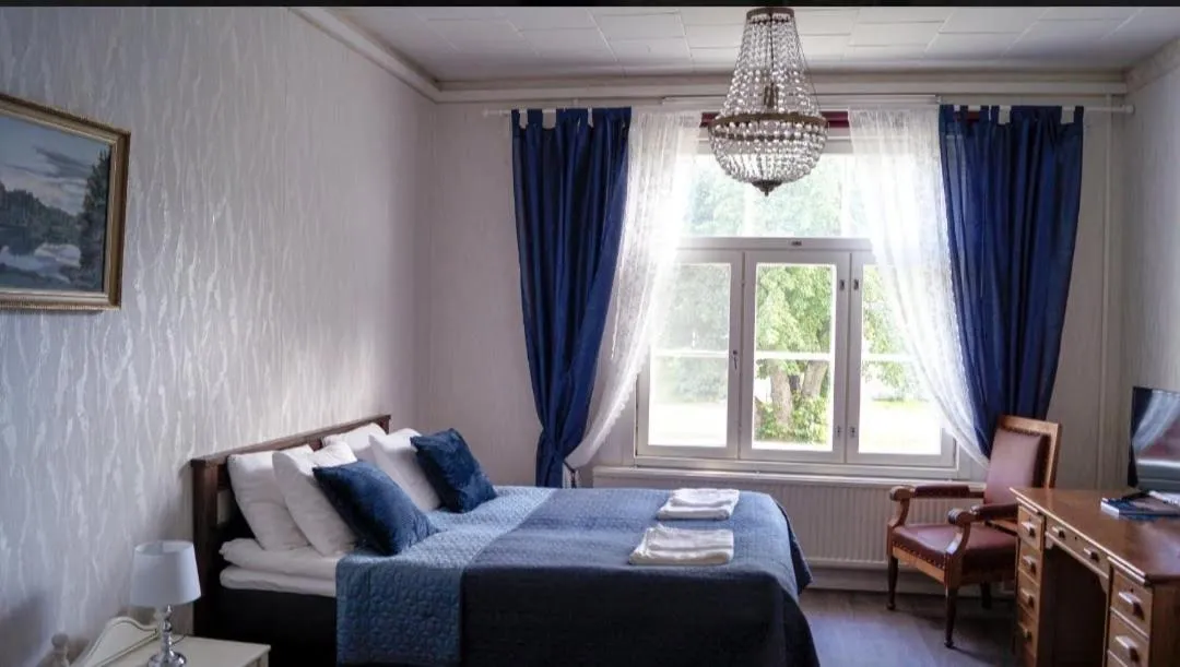 Photo of the whole room, Bed in Kartanomajoitus Sofia & Angelique