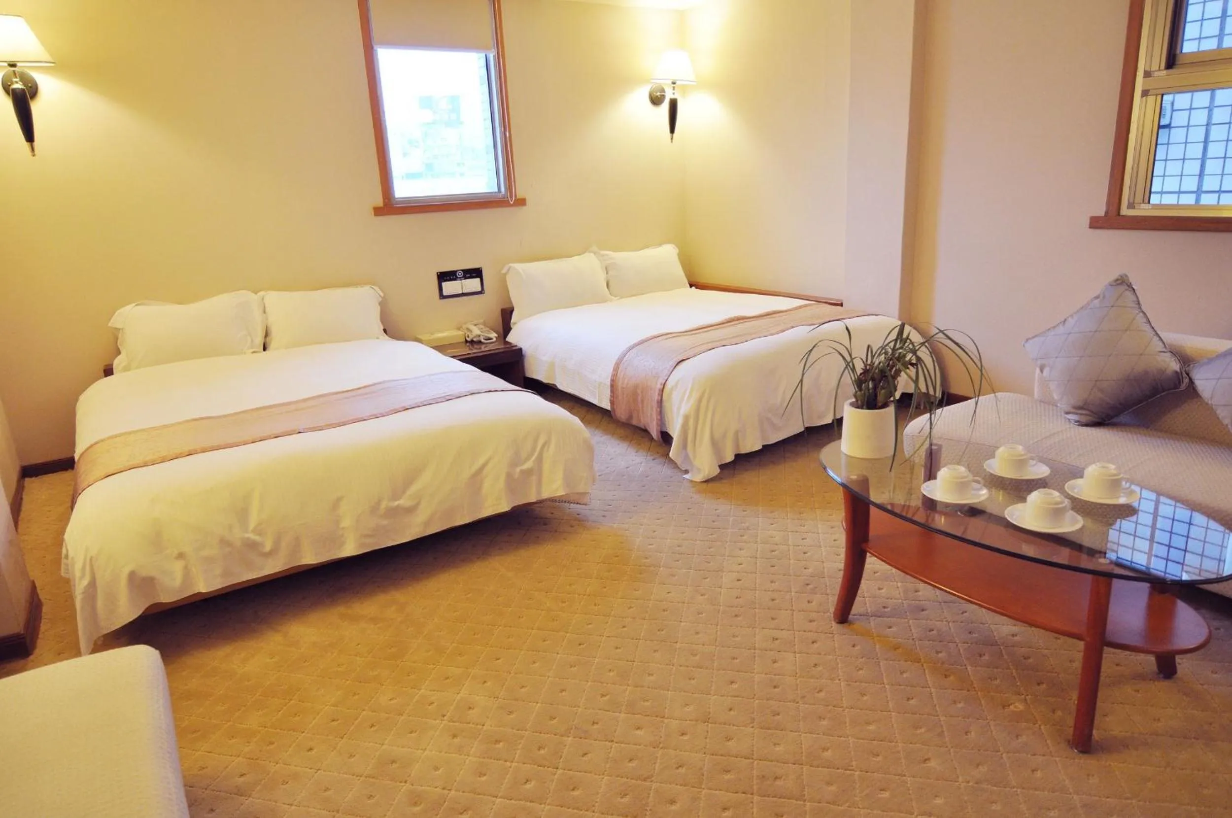 Bed in Tian Long Hotel