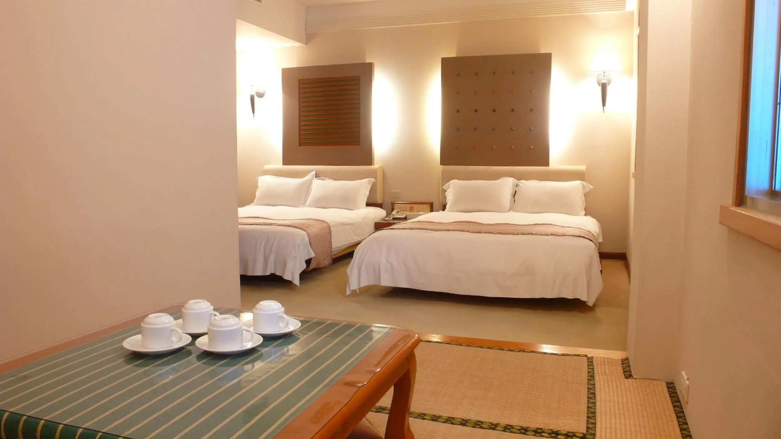 Bed in Tian Long Hotel