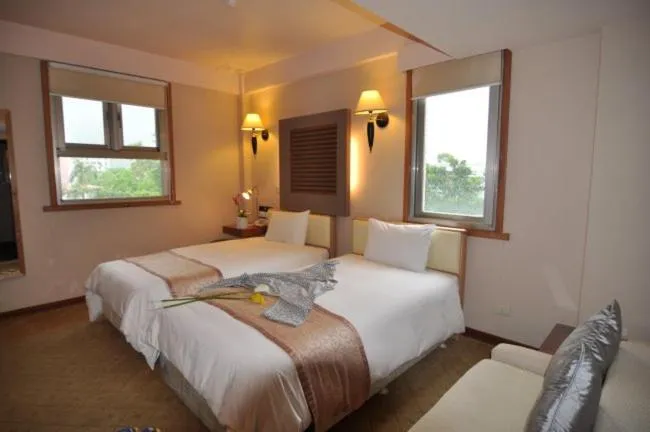 Bed in Tian Long Hotel