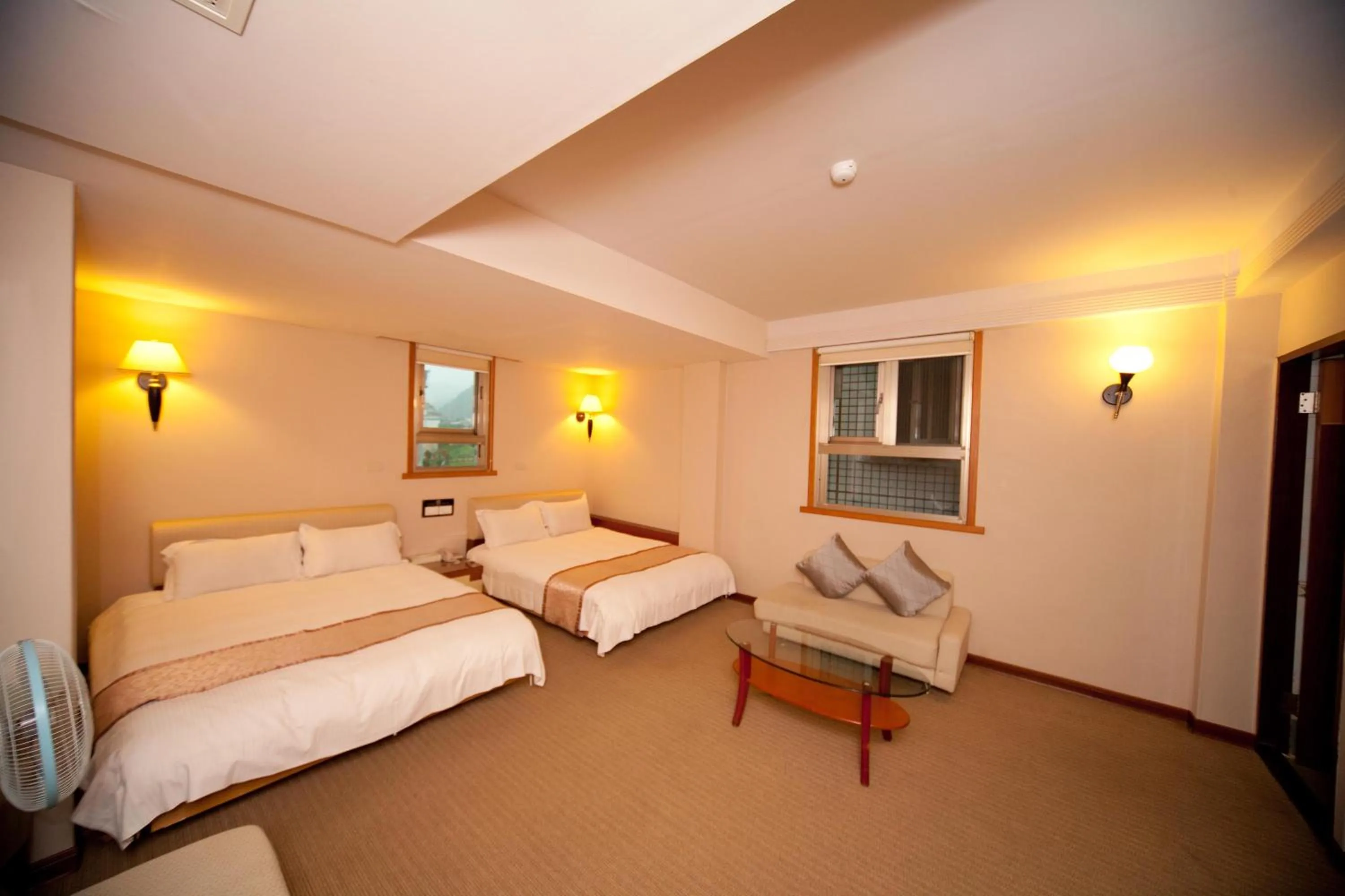 Bed in Tian Long Hotel