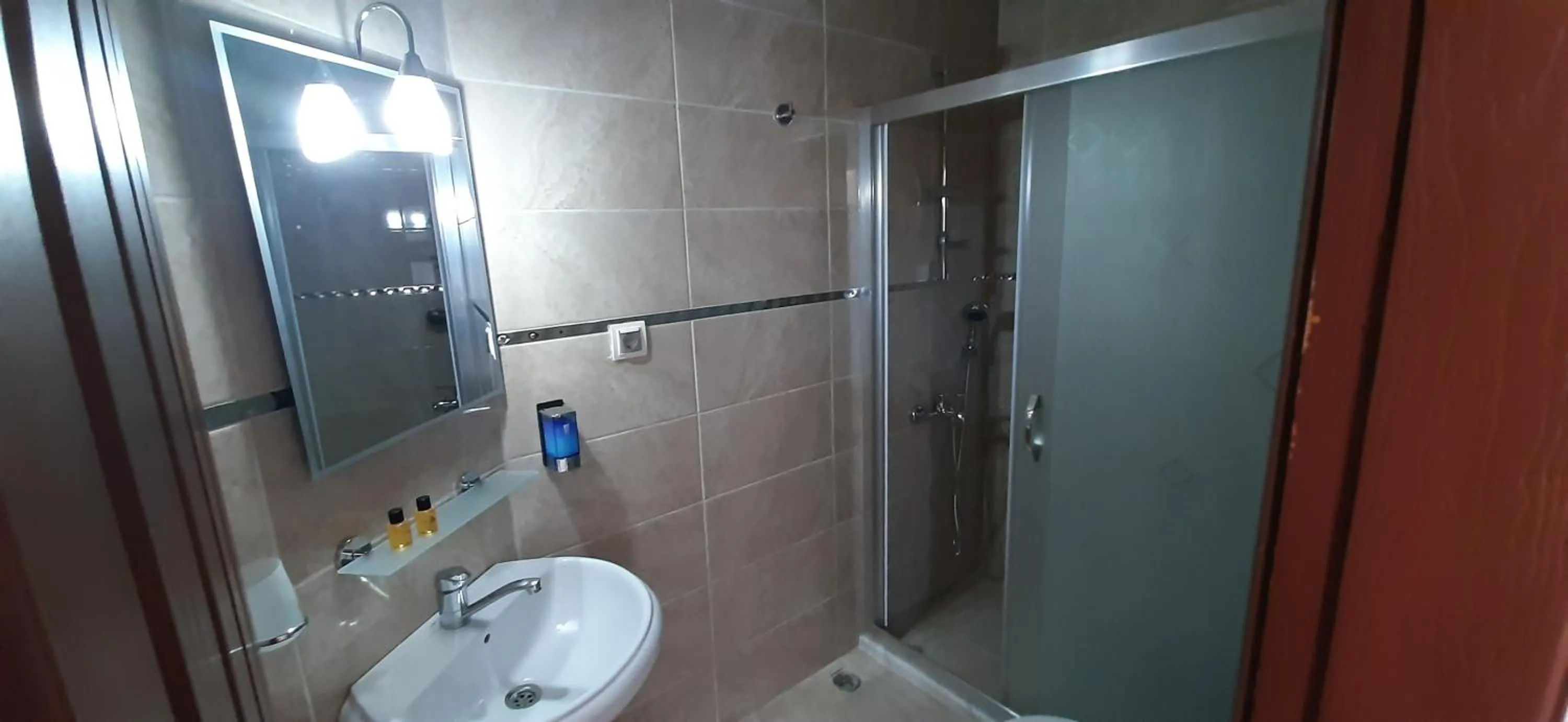 Bathroom in Everest Apart Hotel