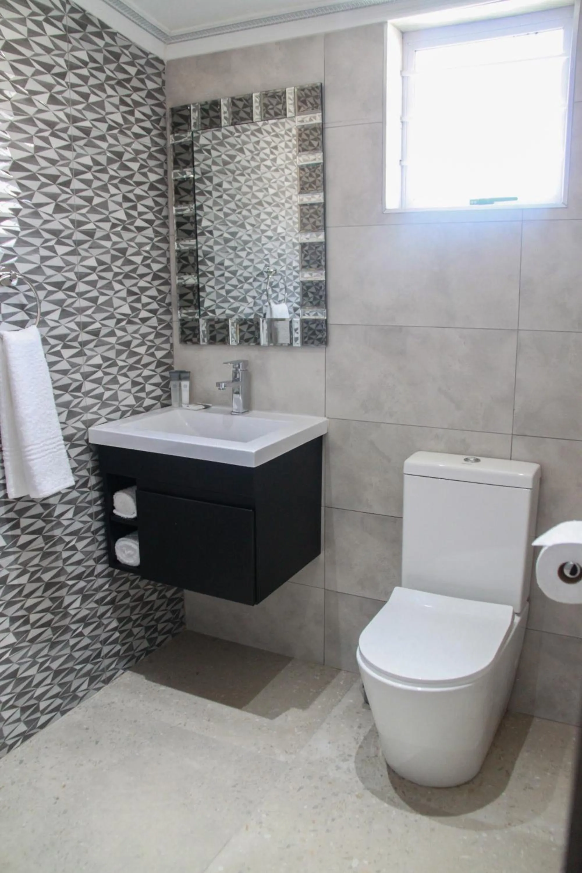 Bathroom in The Cato Suites Hotel