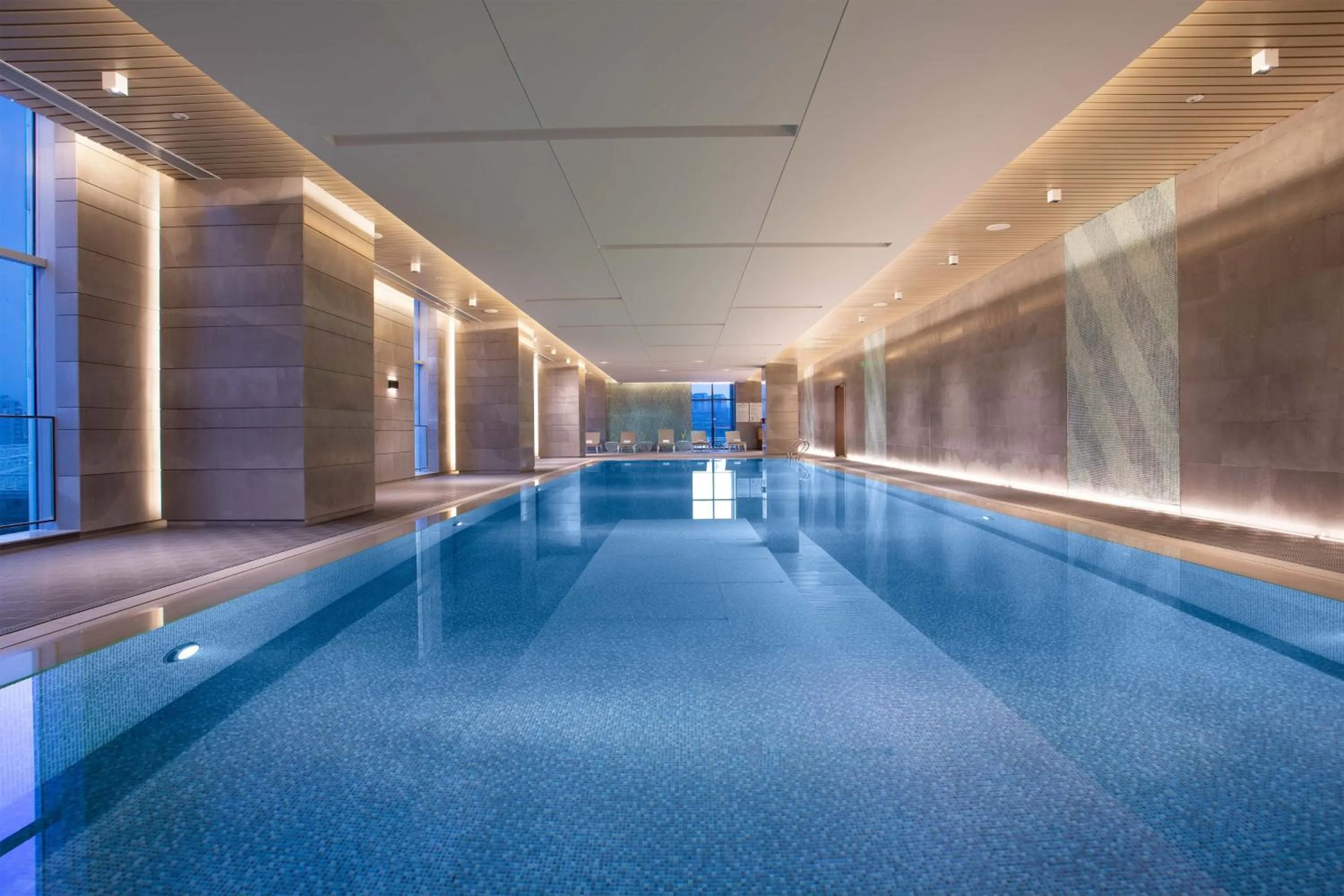 Swimming pool in Holiday Inn Wuxi Central Station by IHG