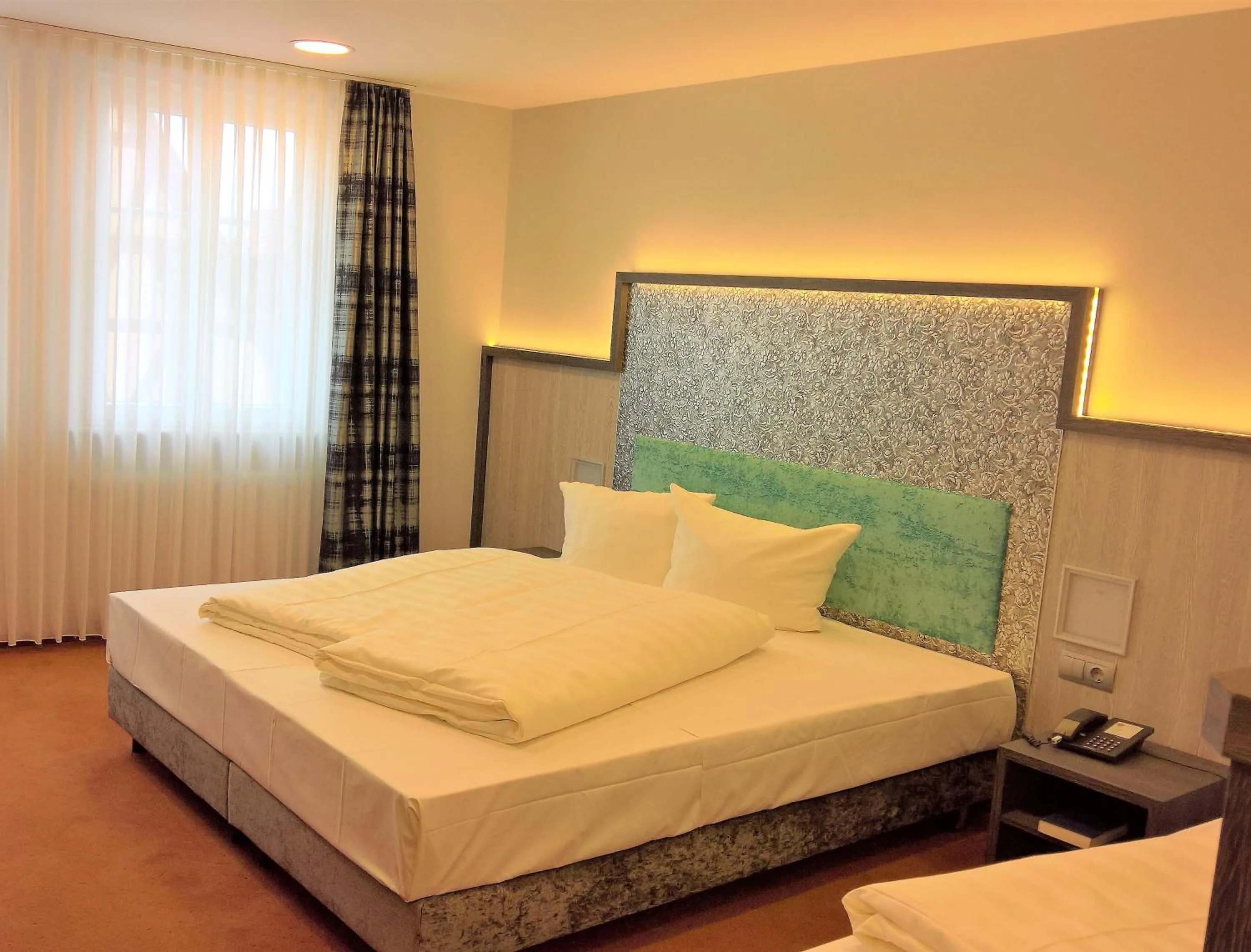 Photo of the whole room, Bed in Hotel Sonne - Das kleine Altstadt Hotel