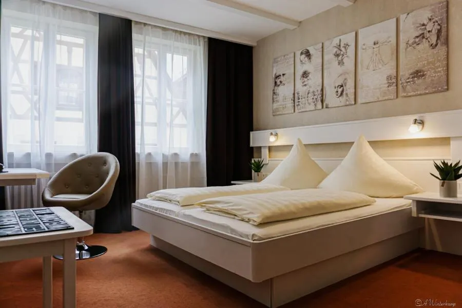 Photo of the whole room, Bed in Hotel Sonne - Das kleine Altstadt Hotel