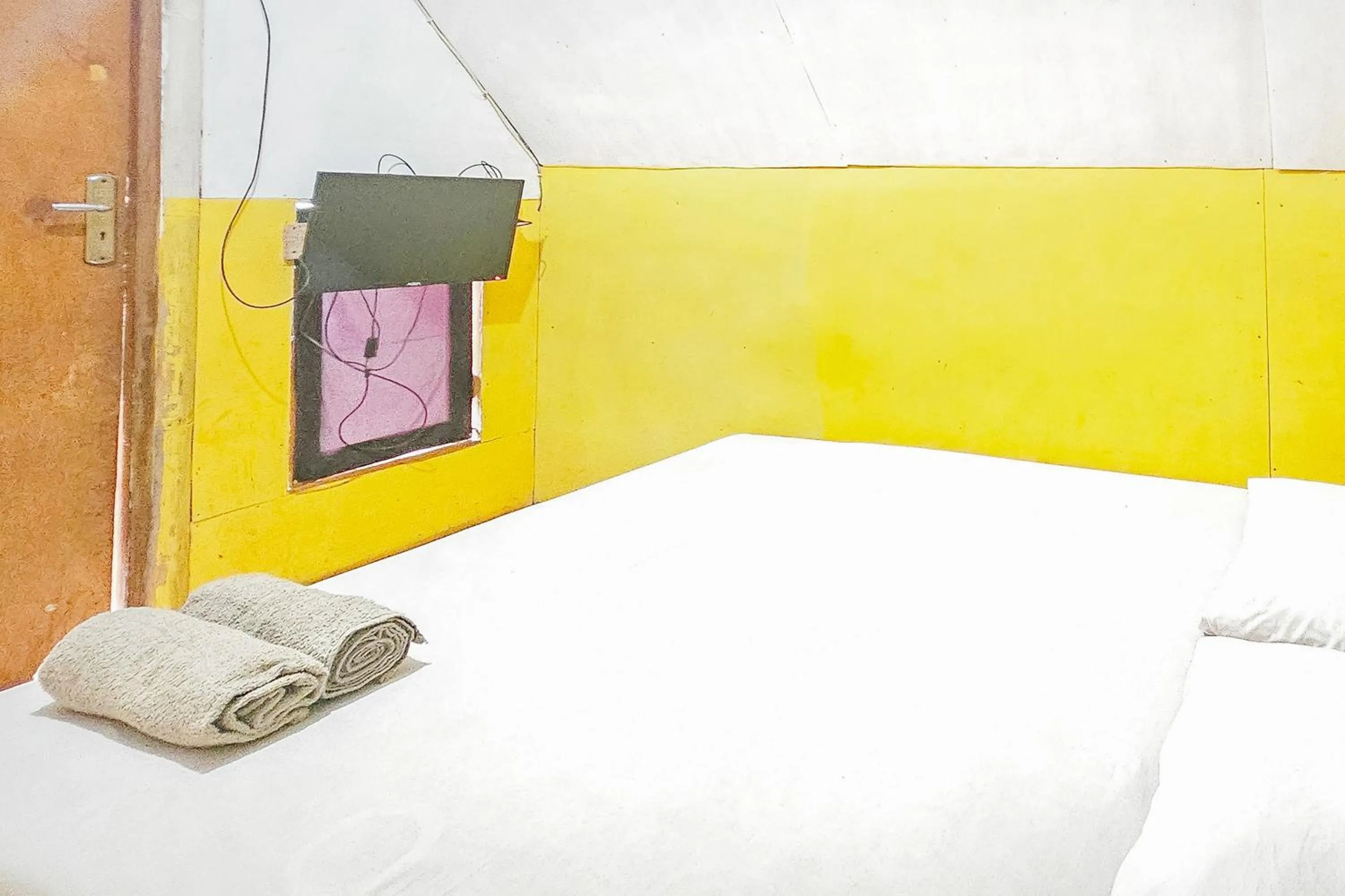 Bed in Cigadog Residence Mitra Reddoorz