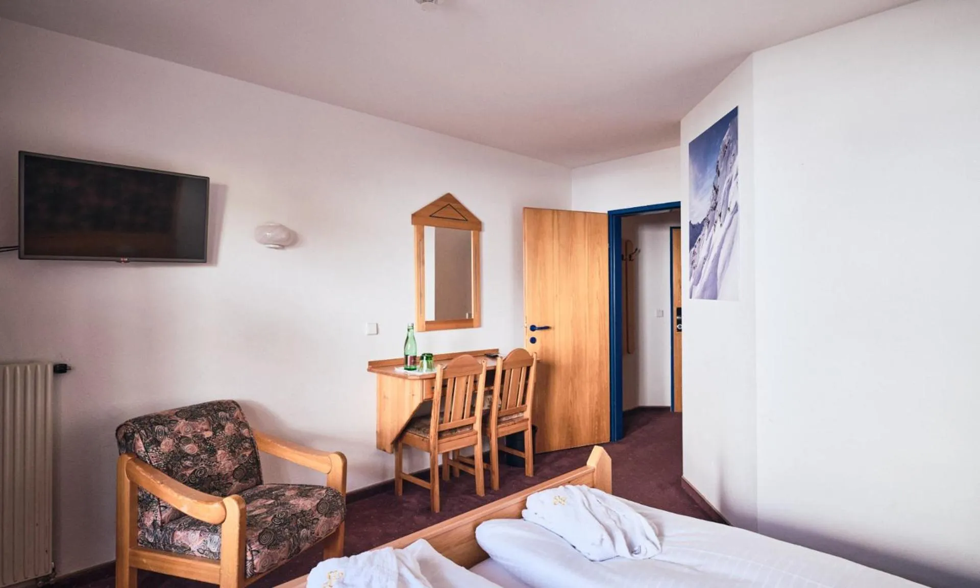 Bed in Hotel Enzian by Alpeffect Hotels