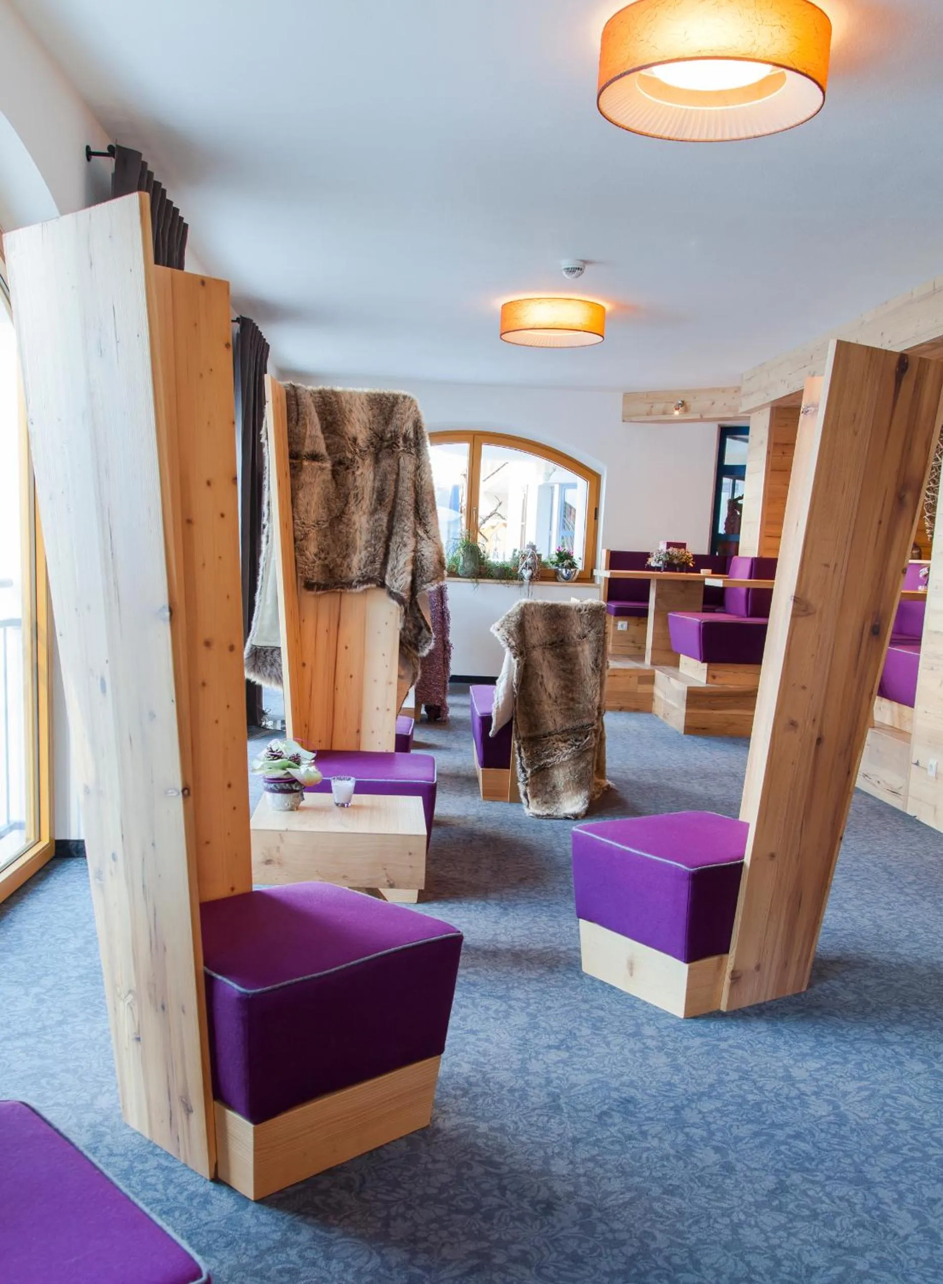 Lounge or bar in Hotel Enzian by Alpeffect Hotels