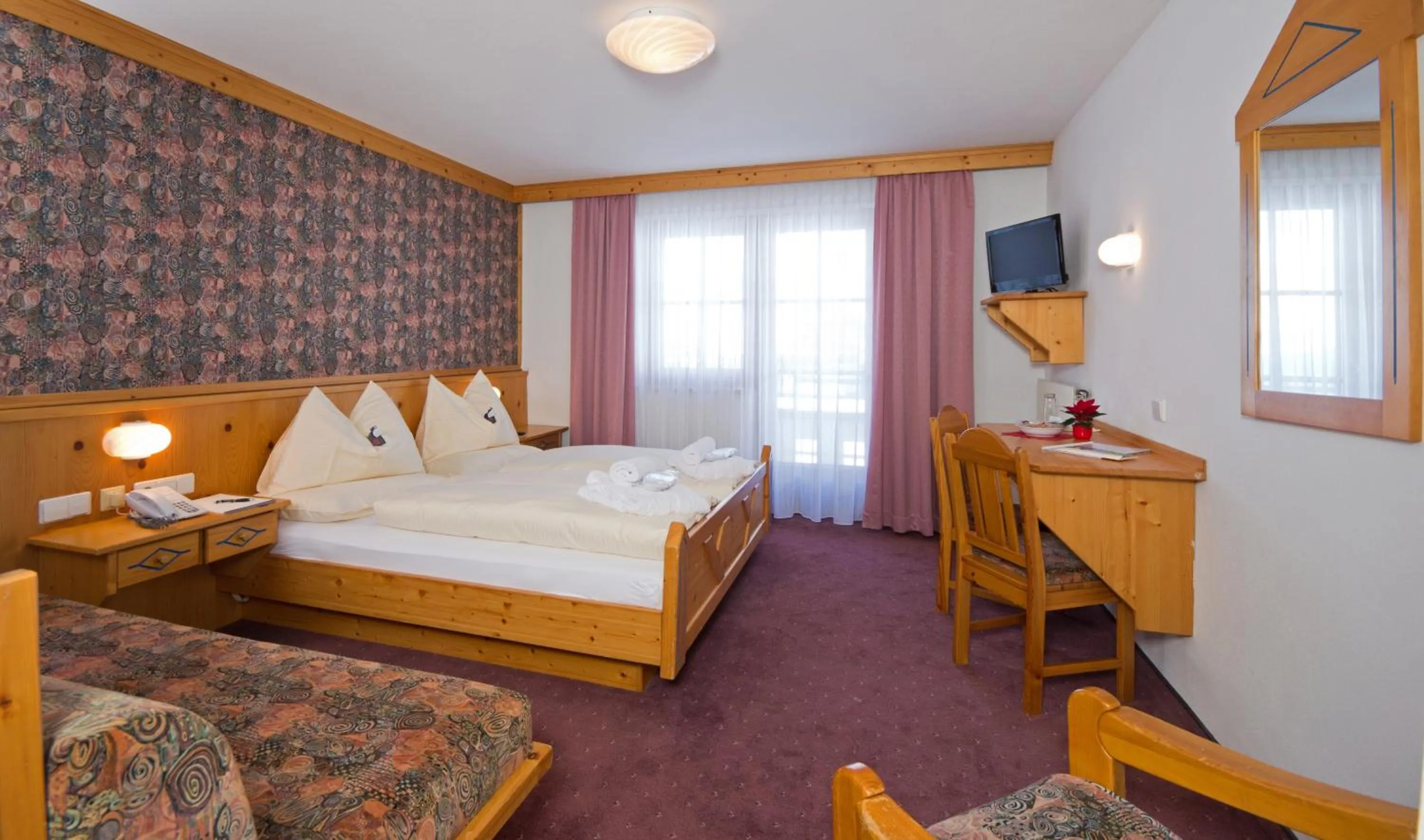 Bedroom, Bed in Hotel Enzian by Alpeffect Hotels